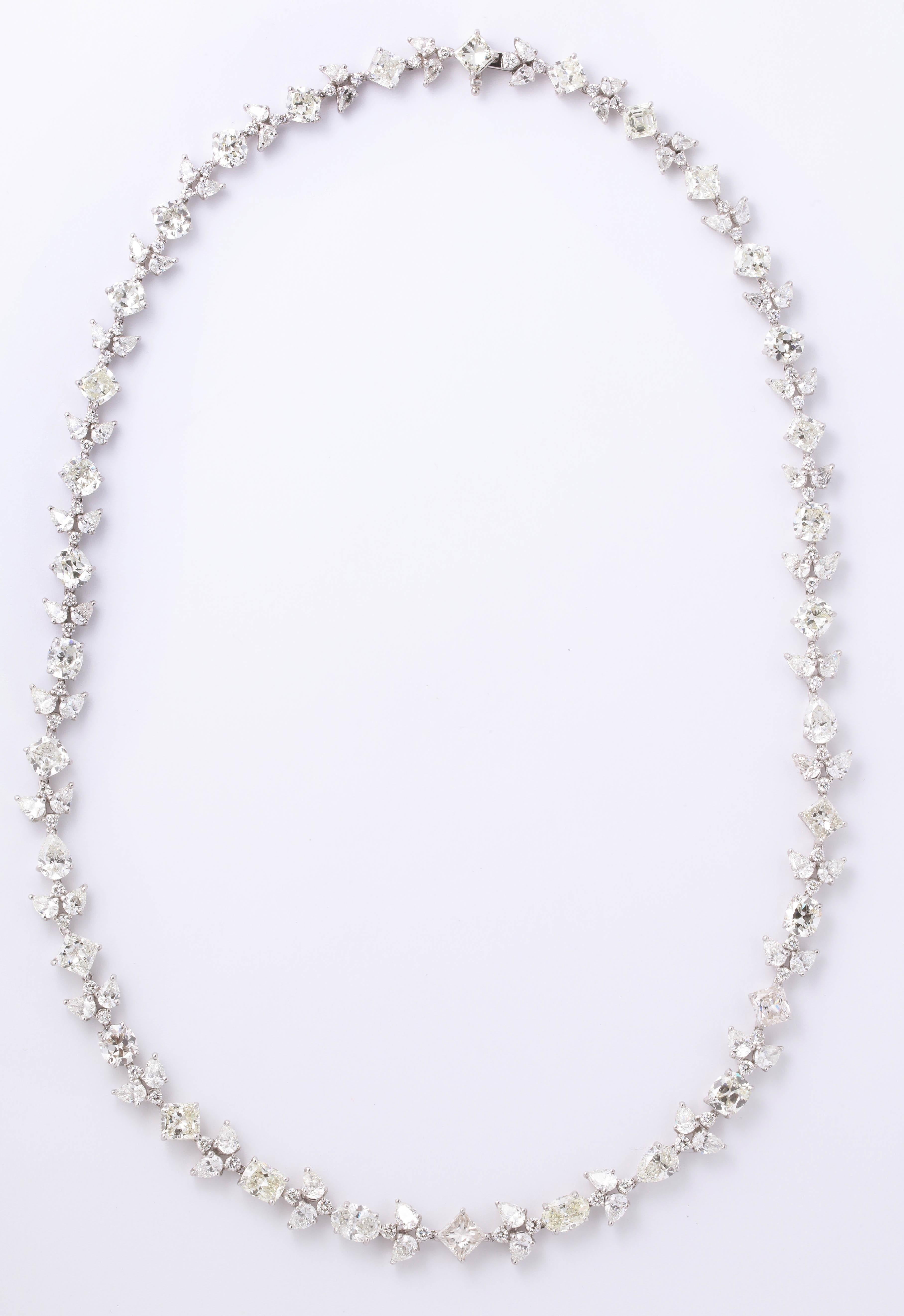 
A FABULOUS 20.5 inch Diamond Necklace!

53.61 carats of princess, cushion, oval, pear, round and asscher cut diamonds.

An incredible necklace that makes a statement all by itself or can be used to hang an important pendant.

Set in Platinum