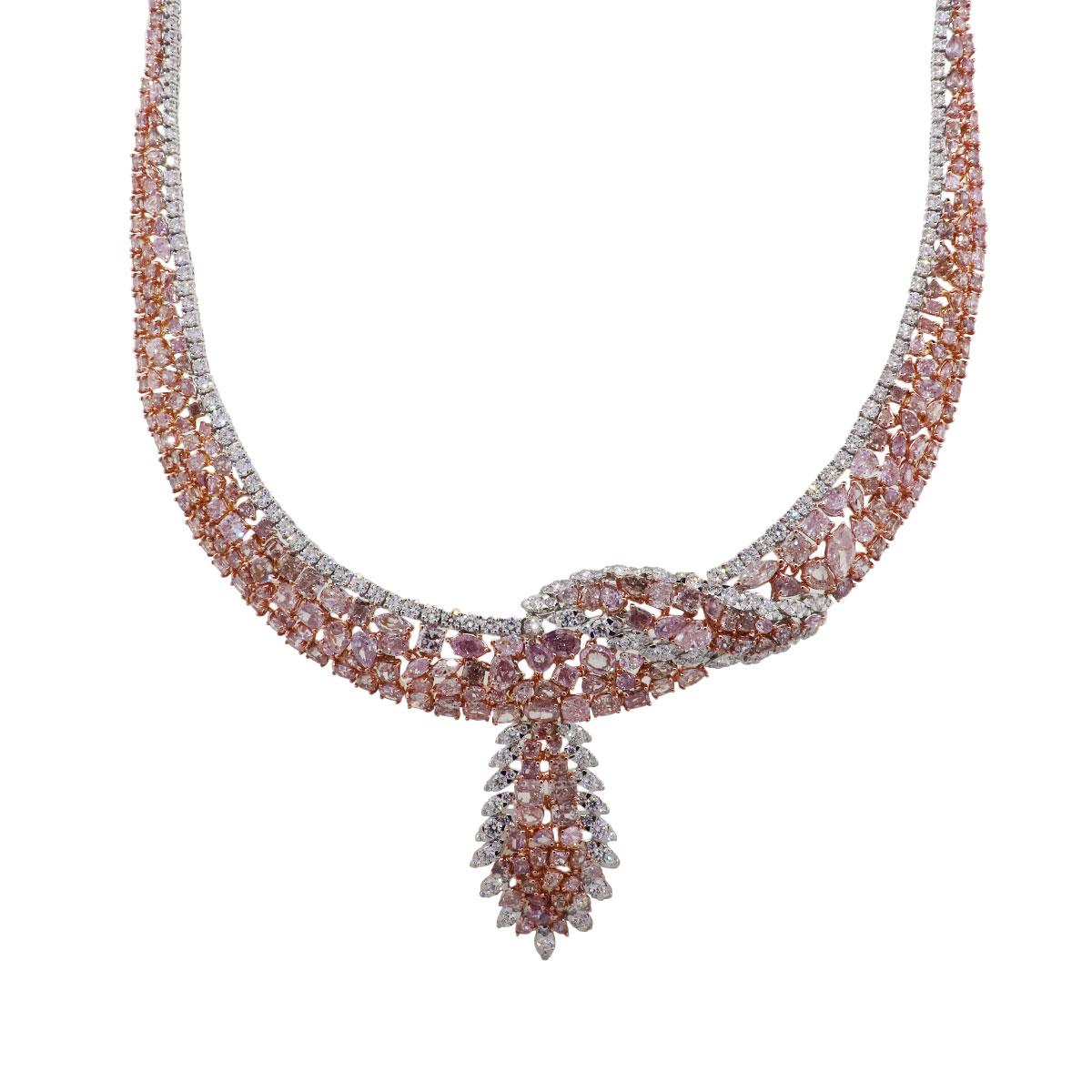 Material: 18k white and rose gold
Diamond Details: Approximately 9.69ctw of round brilliant white diamonds and approximately 41.42ctw of multi shape natural pink diamonds
Measurements: Necklace measures 16.75″ in length.
Fastening: Tongue in box