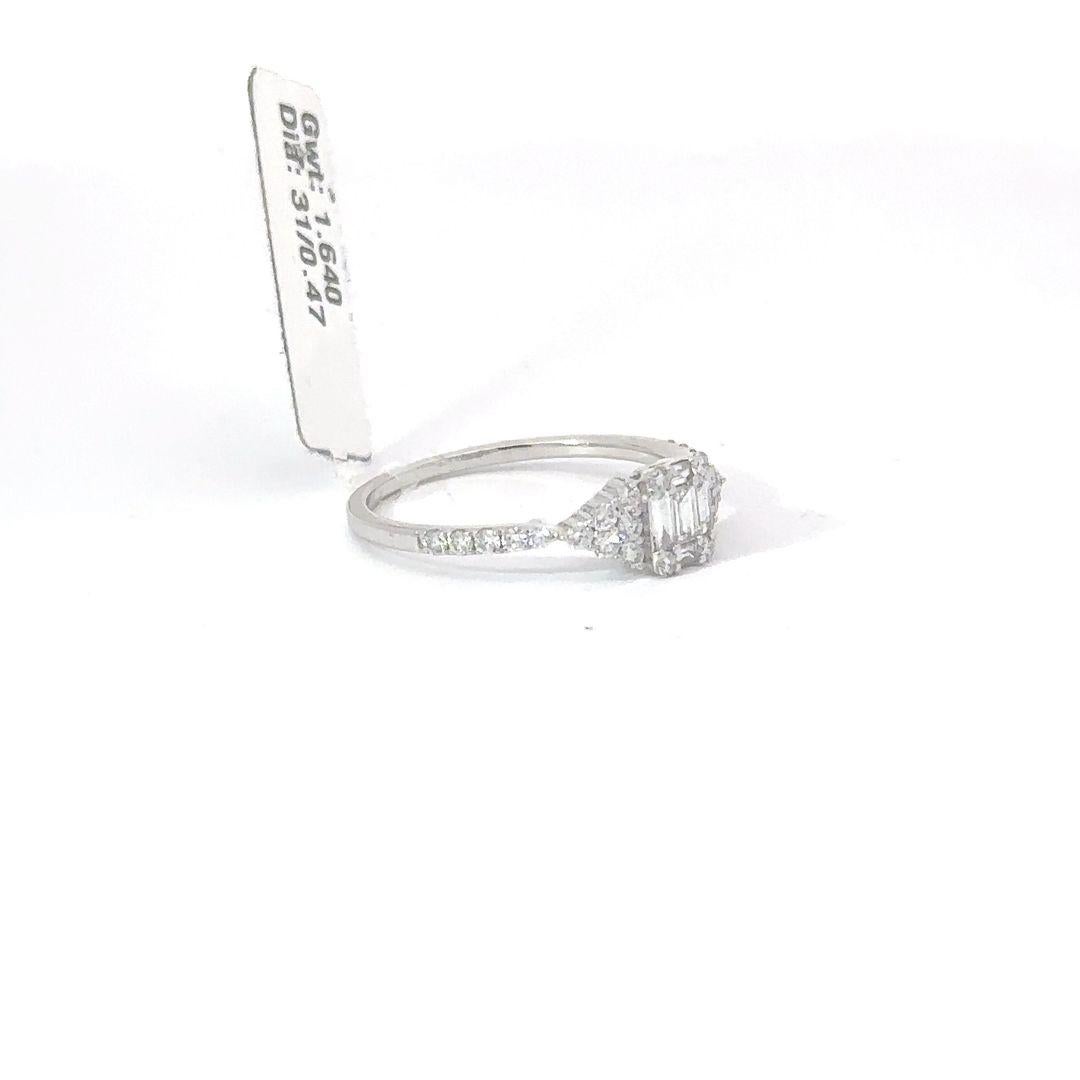 Radiating a vision of eternal beauty, this breathtaking mutli shape diamond engagement ring embodies the essence of unwavering dedication, showcasing a brilliant baguette focal point. Encircled by a delicate band adorned with an array of pavé-set