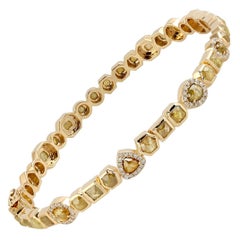 Eternity-Tennisarmband mit gelben Fancy-Diamanten in verschiedenen Schliffformen aus 18-karätigem Gold