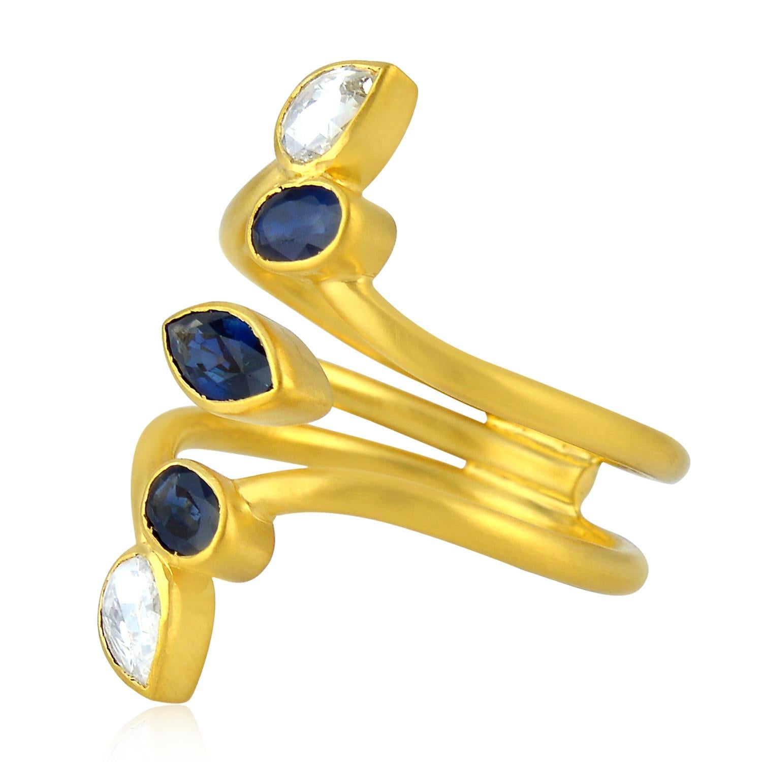 Women's Multi Shaped Blue Sapphire Knuckle Ring With Pear Shaped Diamonds In 18k Gold For Sale