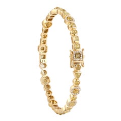 Bracciale tennis con diamanti di ghiaccio a forma multipla in oro 18 carati
