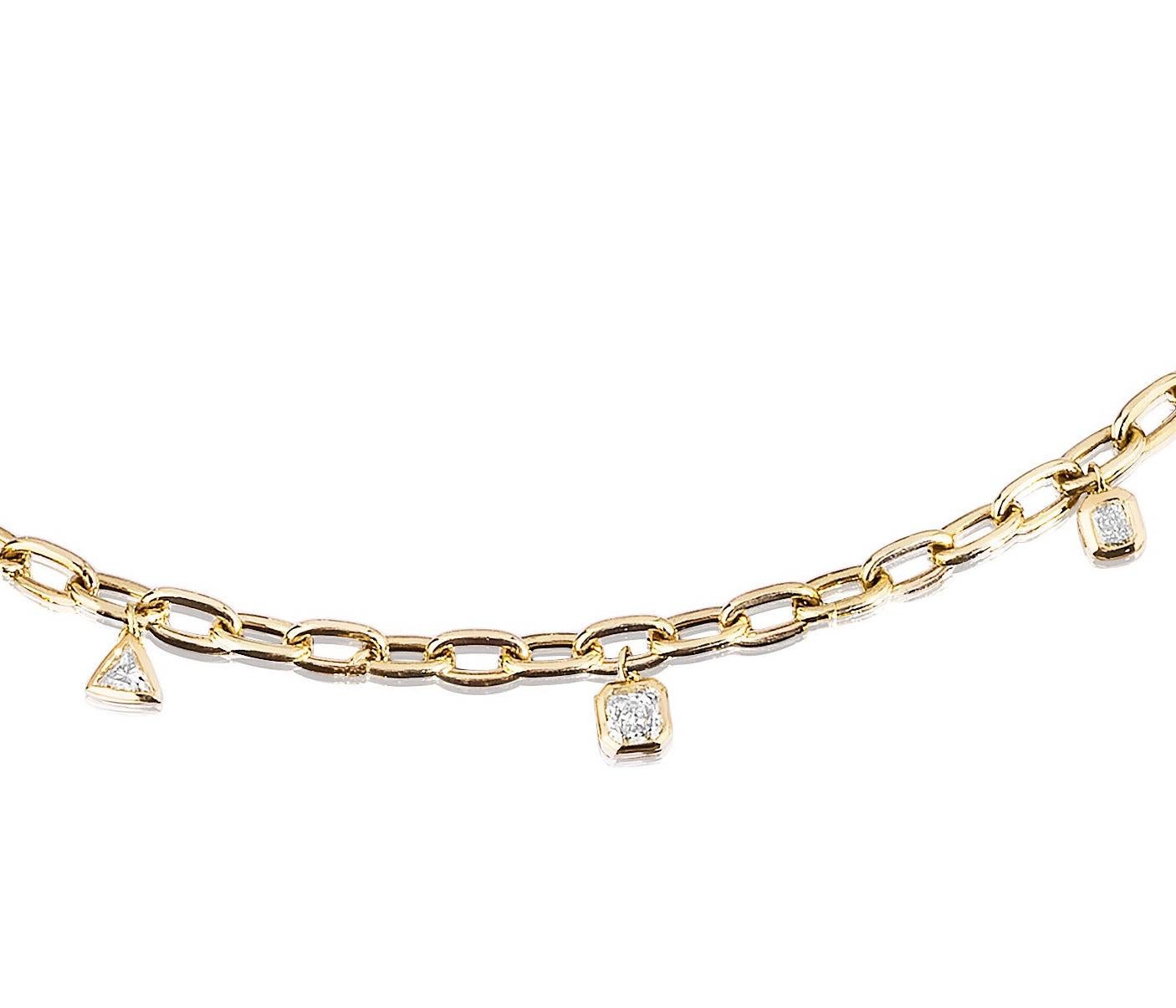 Solid Link bracelet set with 6 Multi Shaped White and Yellow Diamonds in Bezel Set Charm Style.
Great for Stacking with a watch a bangle/bracelet or with multiple of these Bracelets as shown.
1.33 Carats.
18 Karat Yellow Gold.
Lobster Claw