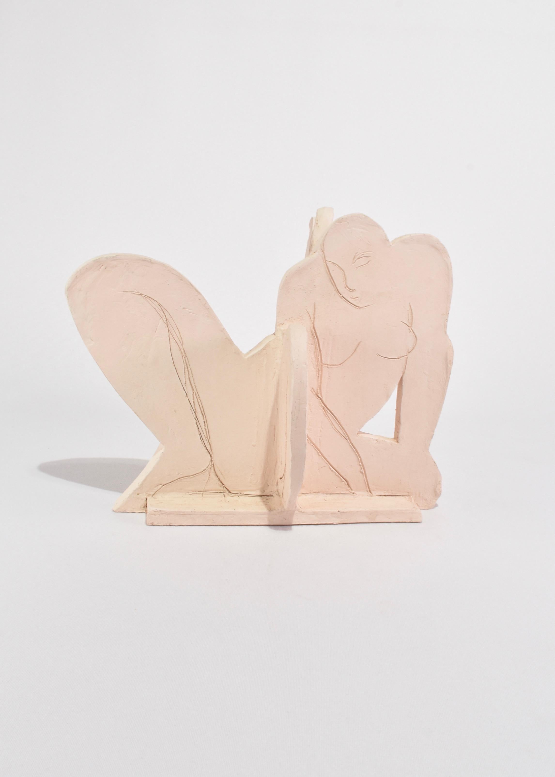 Hand-built ceramic figural sculpture with multiple dimensions. Unglazed, by Josephine Kress.