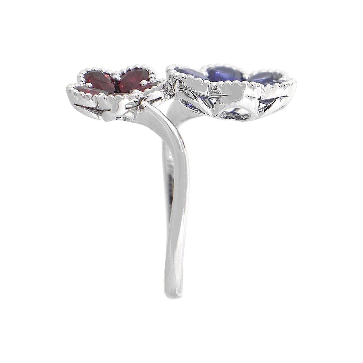 Material: 18k White Gold
Diamond Details: Approx. 0.07ctw round cut diamond. Diamond are G/H in color and SI in clarity.
Gemstone Diamond Details: Approx. 2.20cts of pear shape sapphire stones. Approx 1ct of pear shape ruby stones.
Ring