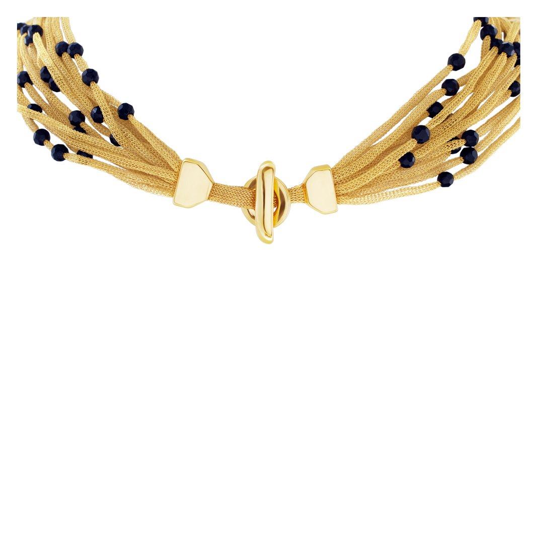 Mehrreihige Halskette aus 18 Karat Gold mit facettierten Onyxperlen Stationen im Angebot 1