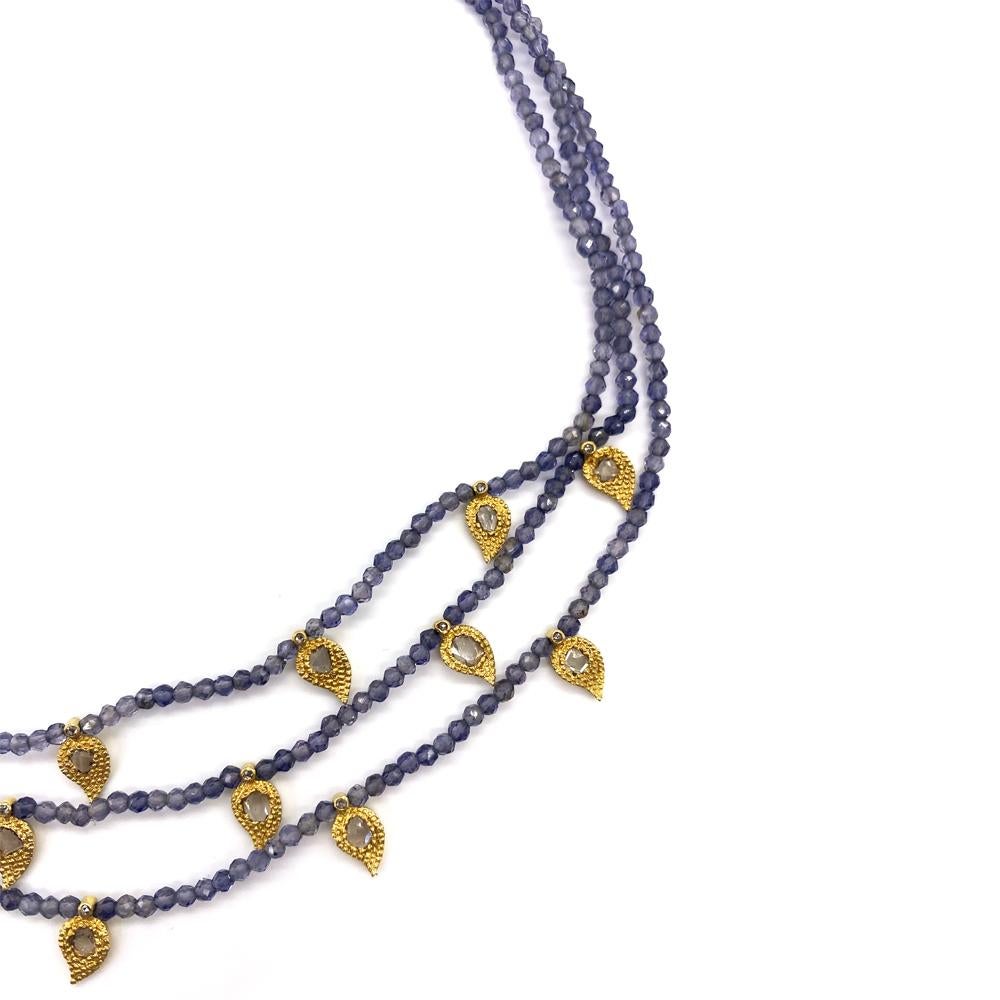 Vitality 20 Karat Yellow Gold Iolite Three Strand Necklace with Fifteen Rose-Cut Paisley Charms. The Necklace Comes With Hook Closures and 1.38 Carat Diamonds.