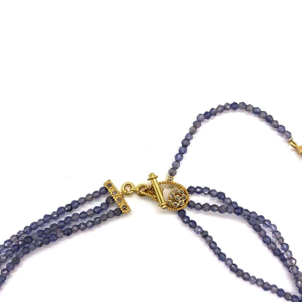 Contemporary Multi-strand 43.65 Carat Iolite Bead Necklace with Yellow Gold Paisley Charms  For Sale