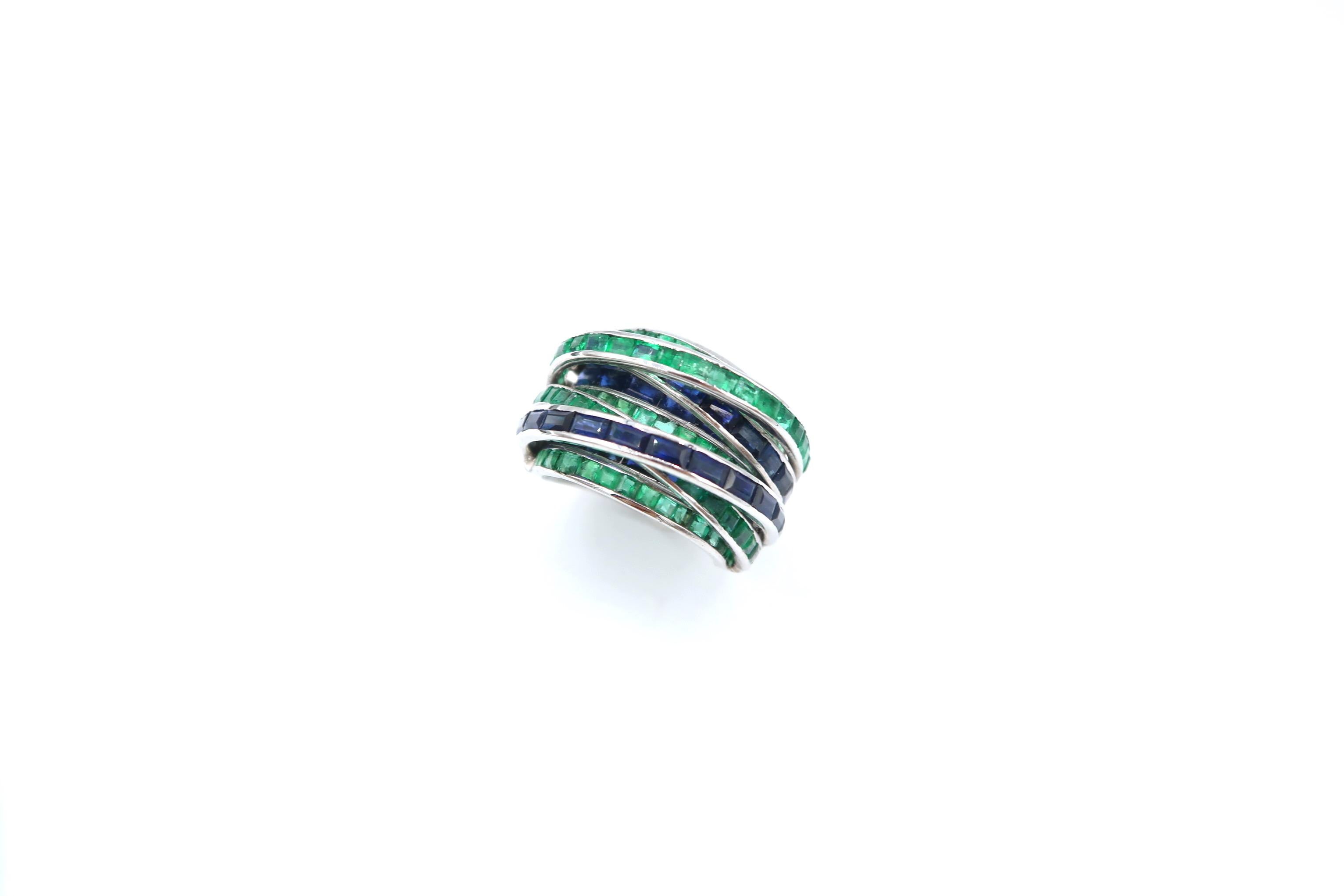 Multistranded 18K White Gold Ring Embellished with Baguette Colombian Emerald and Ceylon Blue Sapphire

Gold: 22.528g.
Sapphire: 4.182ct.
Emerald: 4.32ct.

Ring size: US 6.75