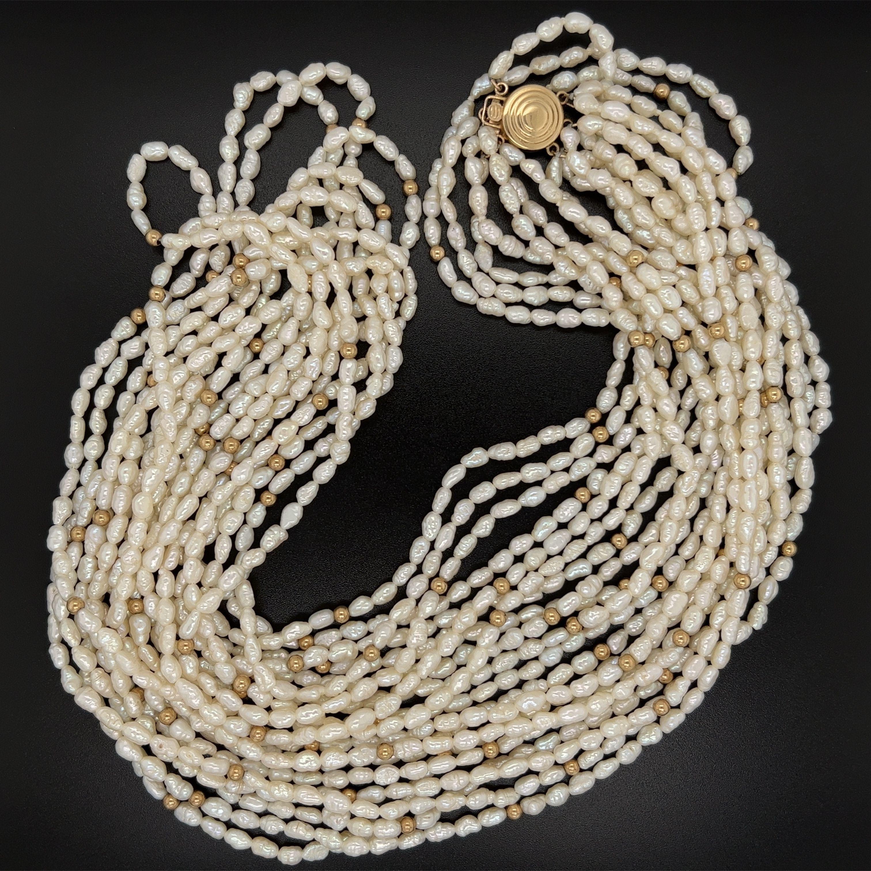 Mixed Cut Multi Strand Baroque Pearl and Gold Bead Necklace For Sale