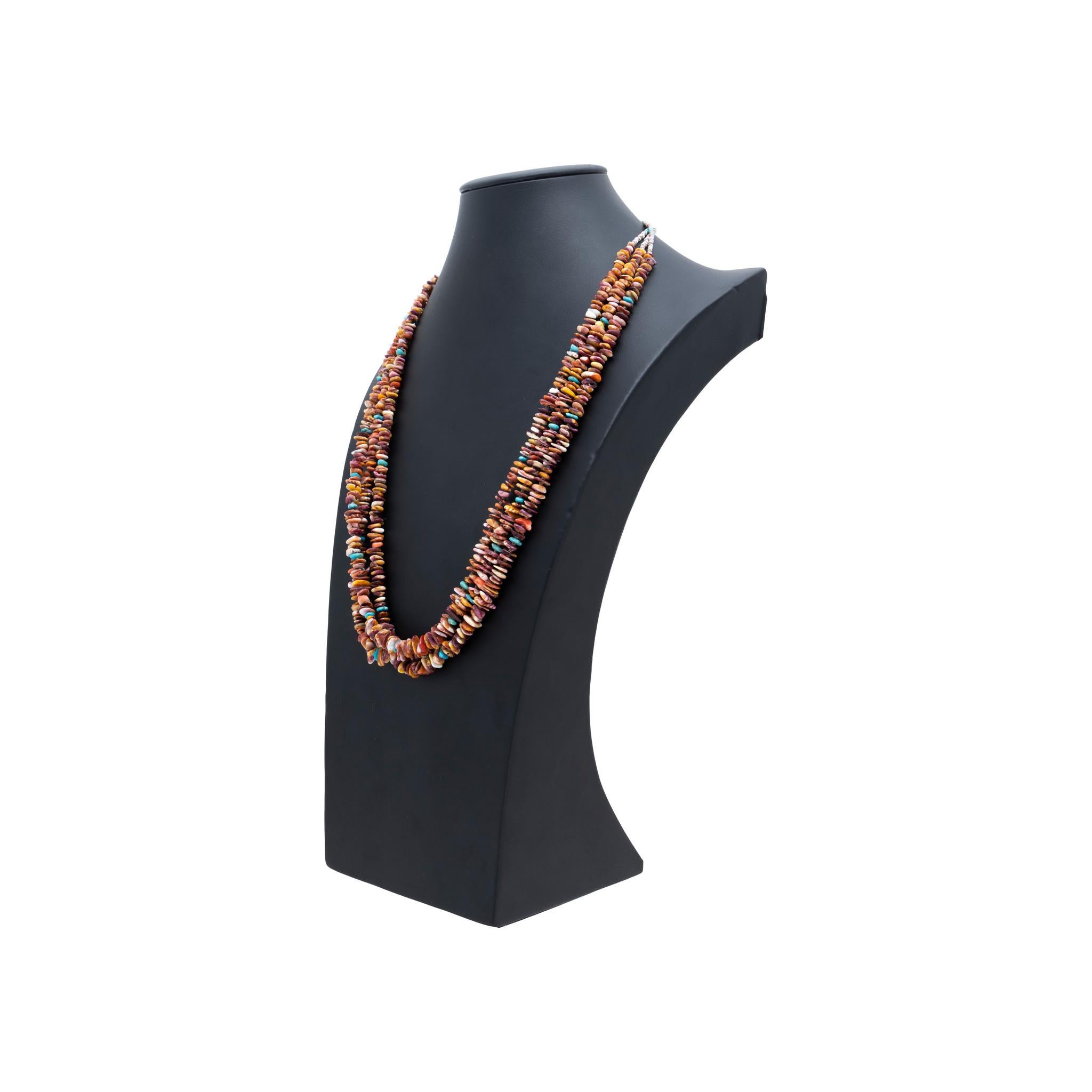 Multi-strand necklace with three strands of graduated beads of turquoise and spiny oyster. Small Heishi beads graduating to discs with sterling silver clasp. Beautiful Southwestern piece, great for solo wearing or layering with other necklaces. Mid