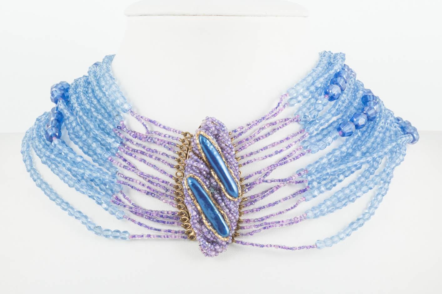 A beautiful and bright necklace and earrings from Milan based company Ornella, contemporaries of Coppola e Toppo. Sixteen rows of mixed faceted demi crystal beads hand in graduated rows from a large and unusual clasp, encrusted in micro beads and