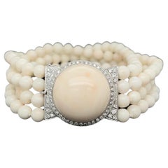Armband ARMANDO DE FALCO, mehrreihige Koralle und Diamant, Gold