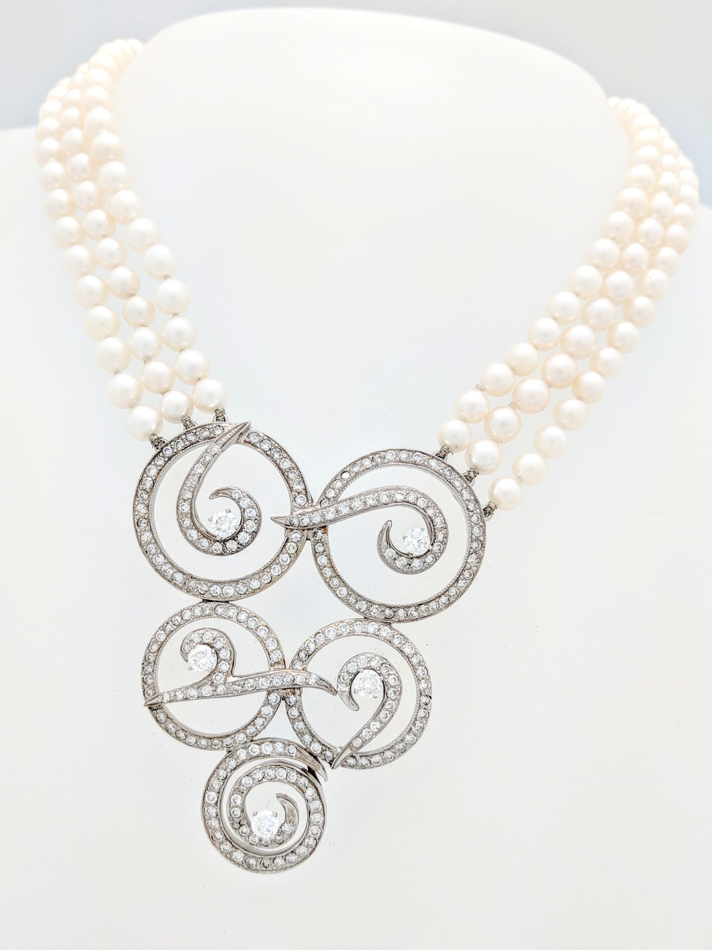 You are viewing an exquisite Estate/Vintage Multi Strand Akoya Pearl and 5ct Diamond Enhancer Necklace.

This piece is circa 1940-50's and is in overall excellent condition for a piece of its age. The pictures do not show the beauty of it and you