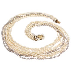 Multi-Strand Fresh Water Pearl Necklace with a Brutalist 14 Karat Gold Clasp