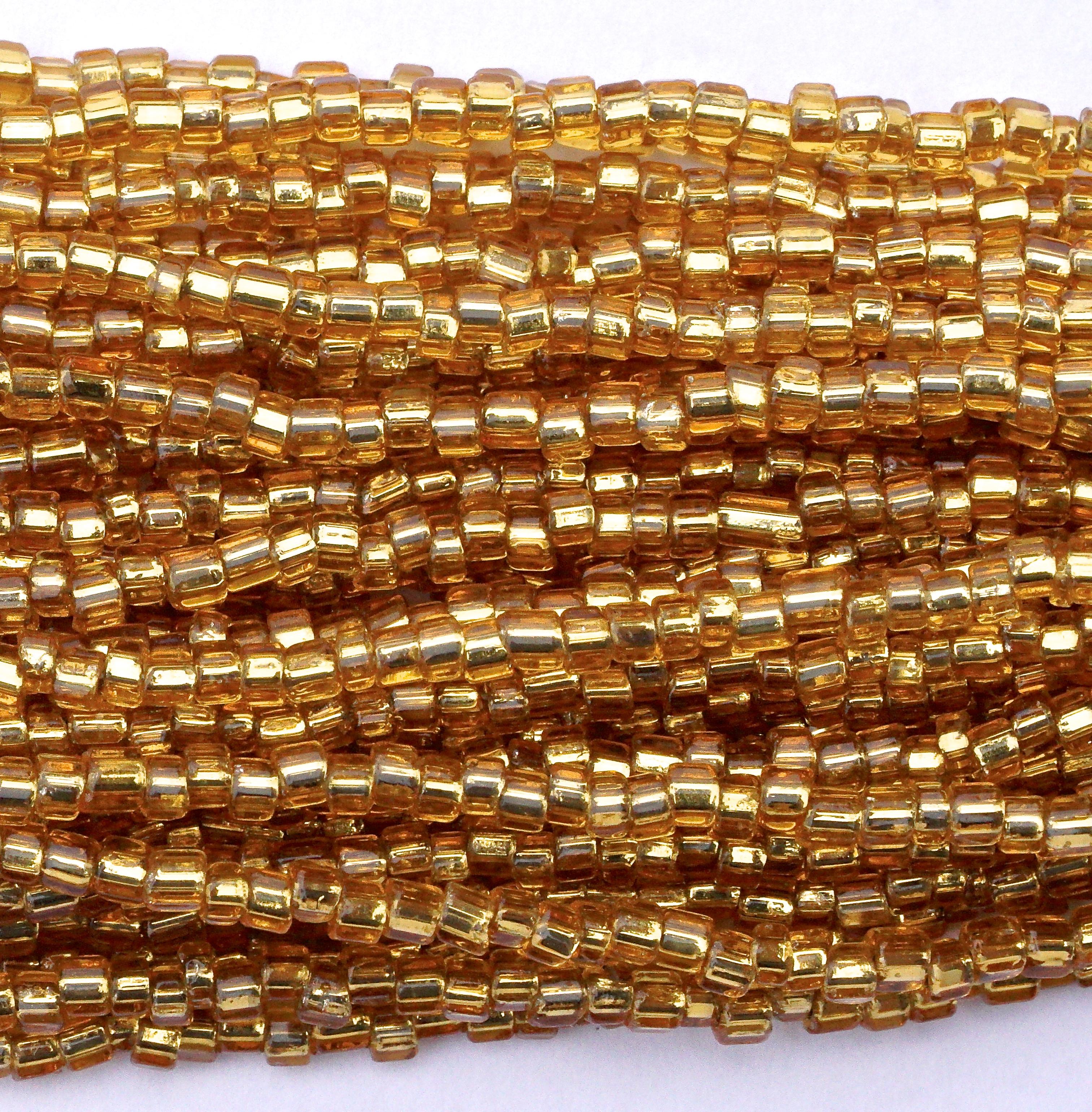 Multi Strand Gold Glass Bead Necklace with Beaded Clasp circa 1960s In Good Condition In London, GB
