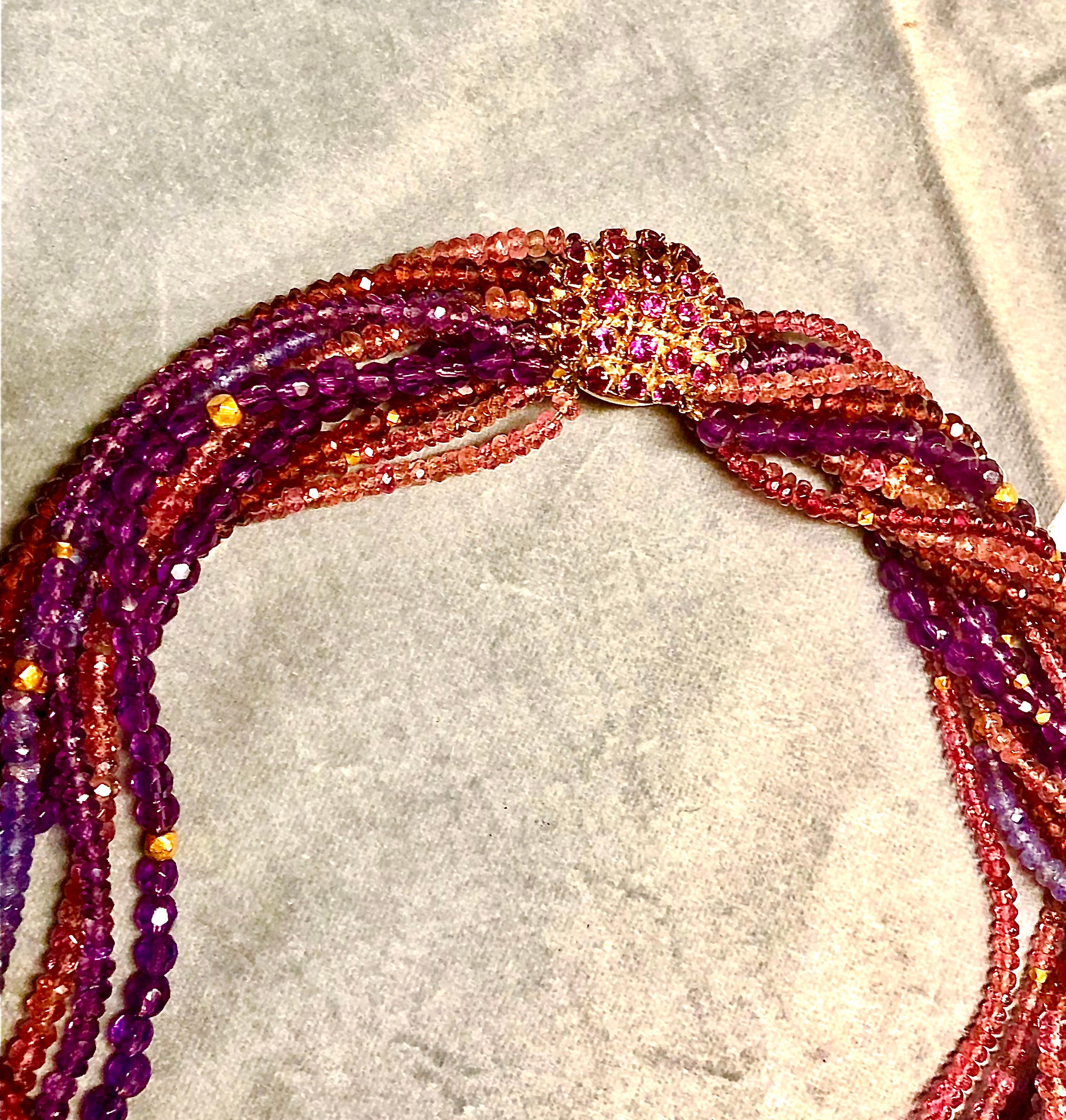 Multi-strand neck. Amythest, tourmaline, iolite w/ 18K gold ruby set box clasp In New Condition For Sale In New Orleans, LA