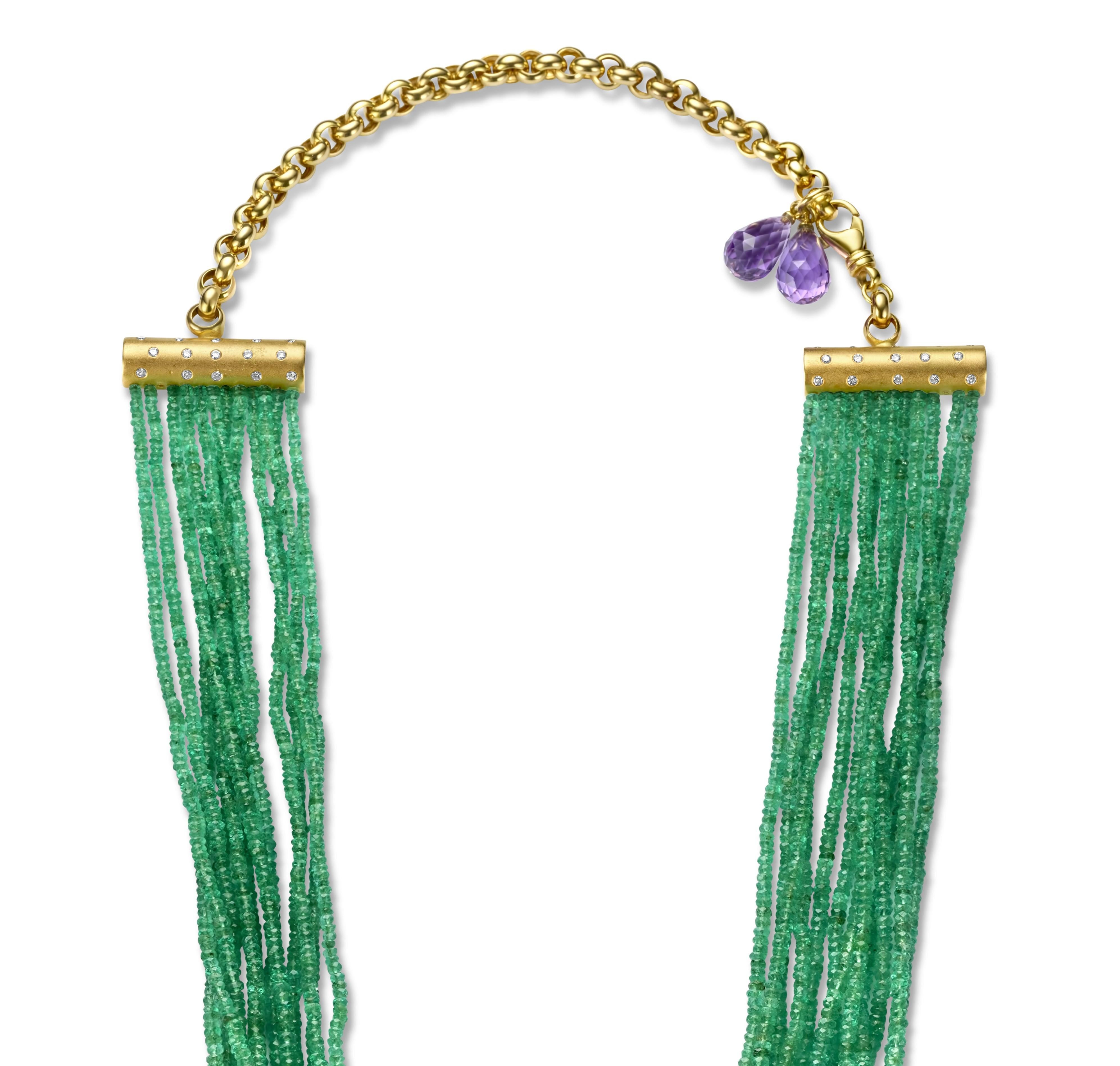 Stunning Multi Strand Necklace 450 ct Columbia Faceted Emeralds CGL Certified & Amethyst Briolets on lock.

Emeralds: 450 Carats  Intense green Columbia Emeralds faceted gemstone

Diamonds: 30 brilliant cut diamonds together approx. 0.6 ct.