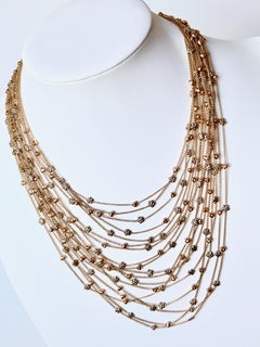 Multi-Strand Necklace in 18 Karat Golds Hearts and Flowers