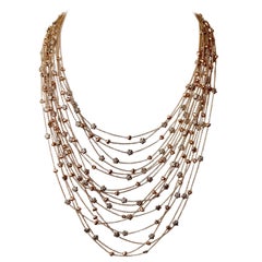 Multi-Strand Necklace in 18 Karat Golds Hearts and Flowers