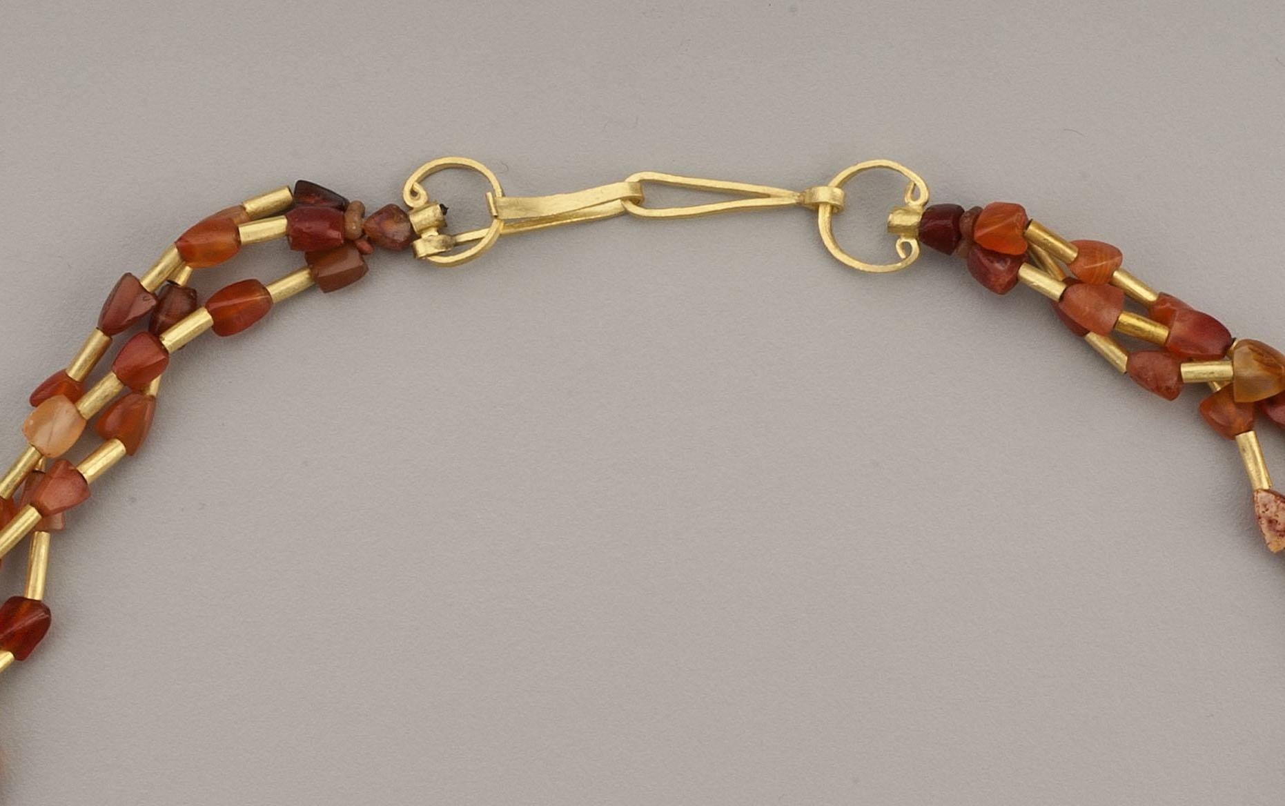 Artist Multi Strand Necklace with Carnelian, Gold Tubes, and Trapezoidal Agate Center For Sale