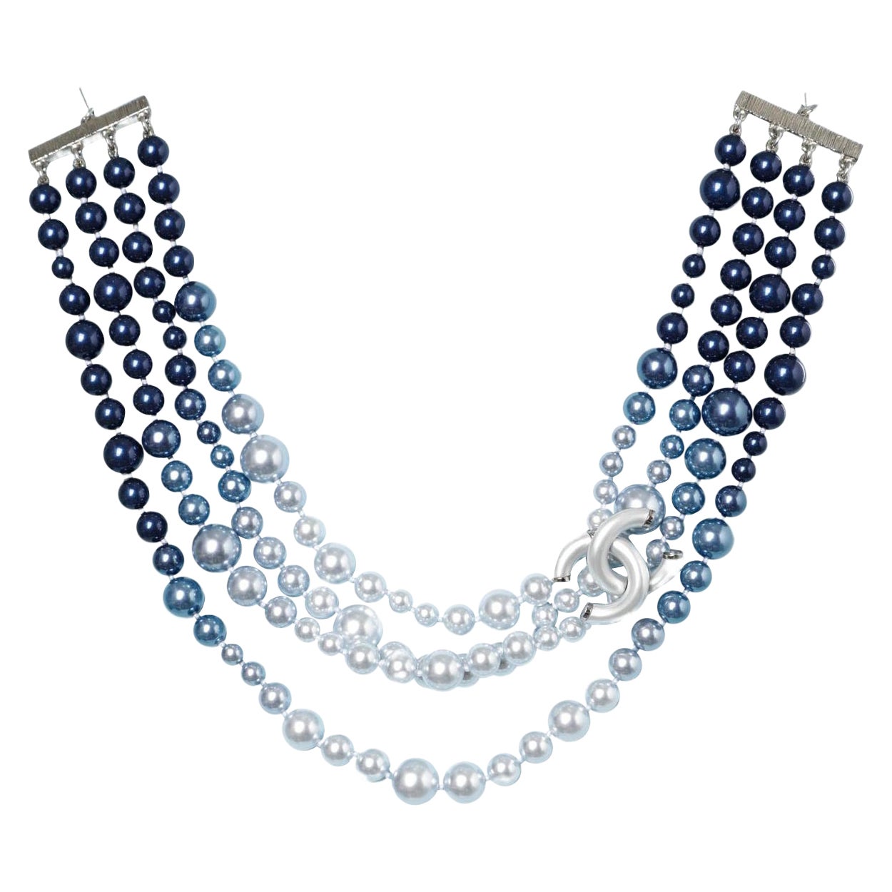Multi-strand neckless in a blue shading and "Double CC"  brand Chanel