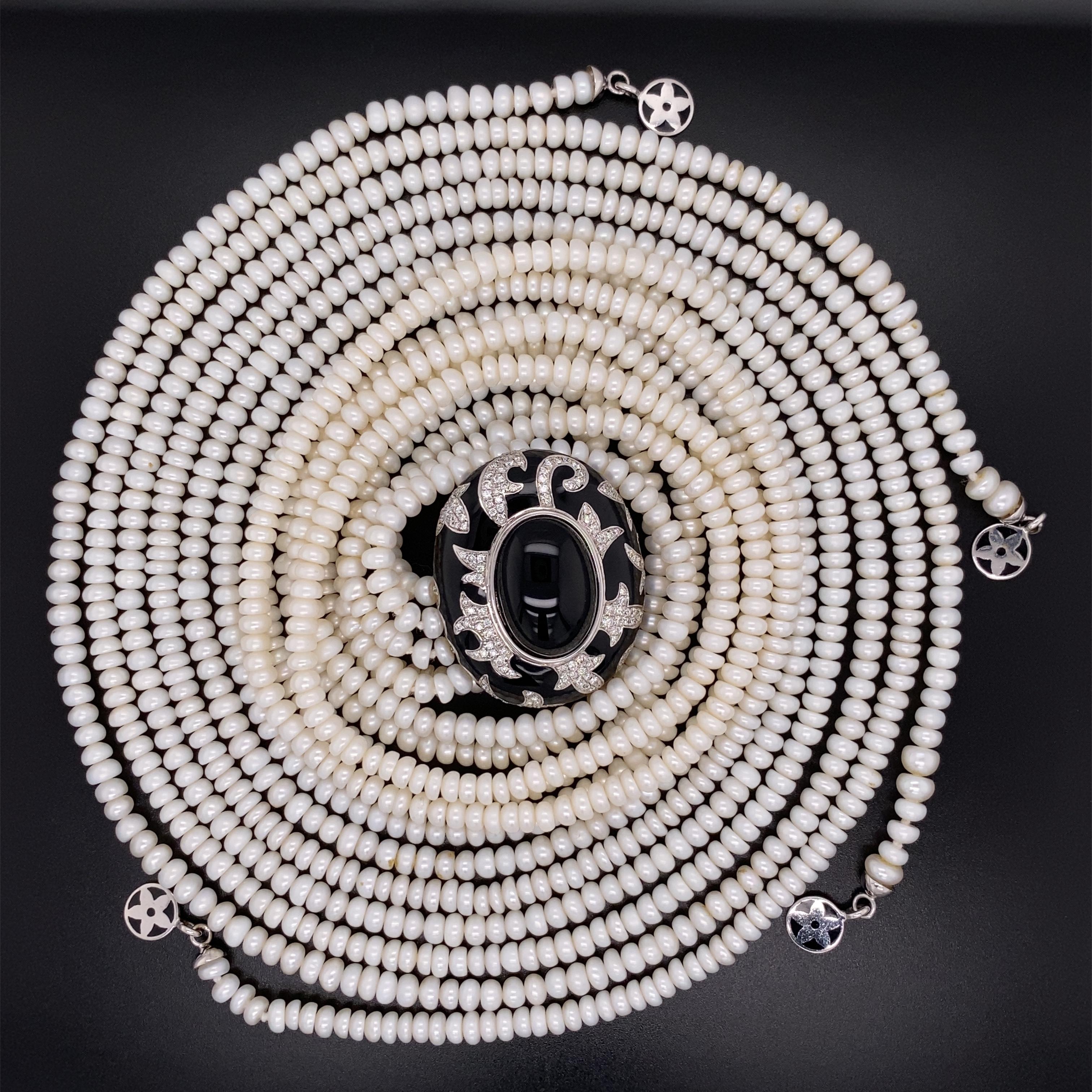 Simply Beautiful! Designer Nouvelle Bague Foglie di Acanto Onyx, Diamond and Black Enamel 18K white Gold Slide on 4 strand Pearl Necklace. 10.09 Carat Onyx and Diamonds 1.85tcw. Original Retail price: $19,000. More Beautiful in real