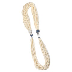 Multi-Strand Pearl Necklace with Diamond, Sapphire, and Ruby Panther Clasps