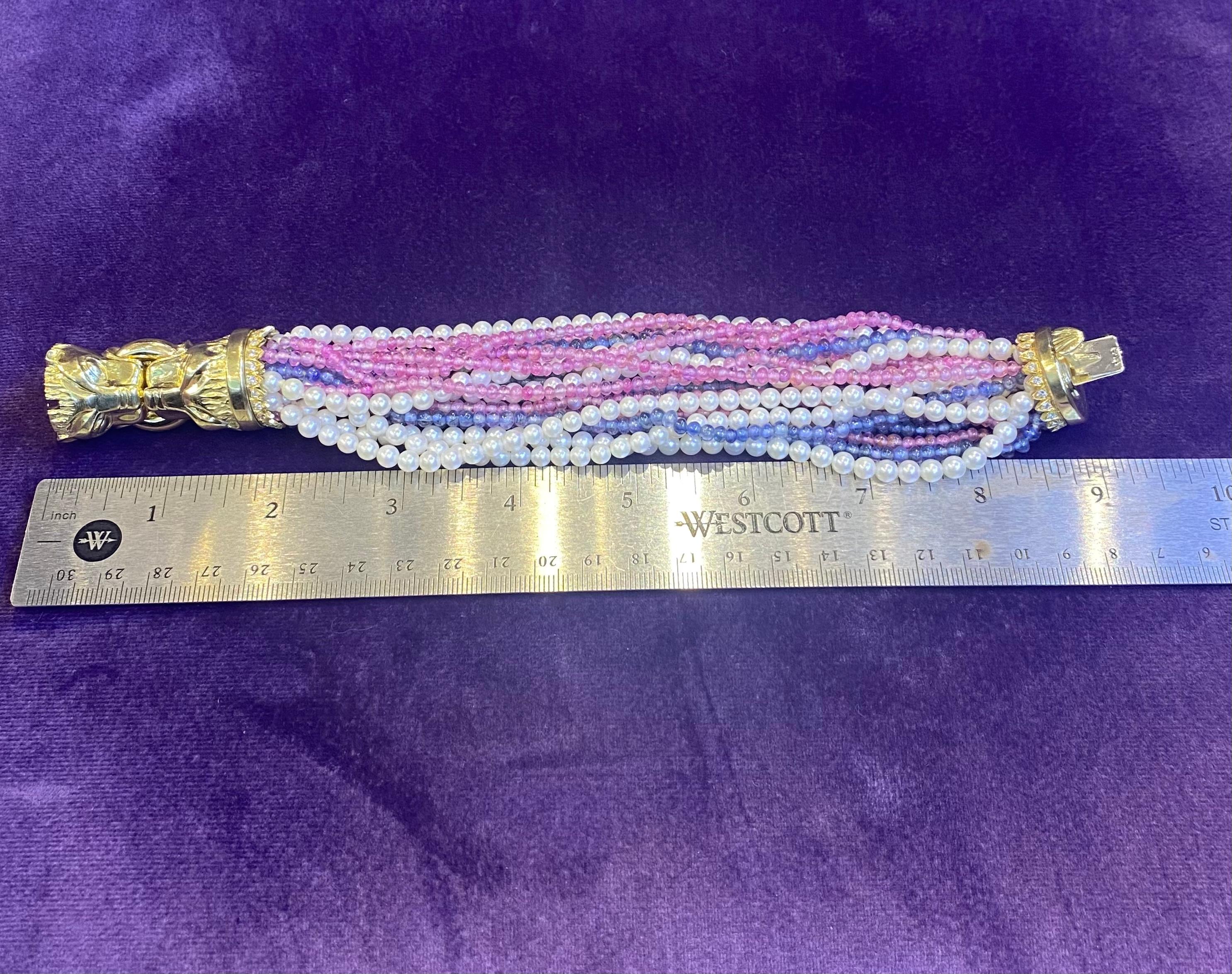 Mehrstrangiges Armband mit Löwenkopf aus Perlen, Rubin und Saphiren im Angebot 6