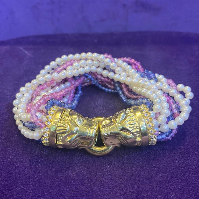 Multi Strand Pearl Ruby & Sapphire Lion Head Bracelet In Excellent Condition For Sale In New York, NY