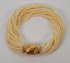 Multi Strand Pearl Twist Bracelet with Decorative 14K Yellow Gold Bow Tie Clasp
