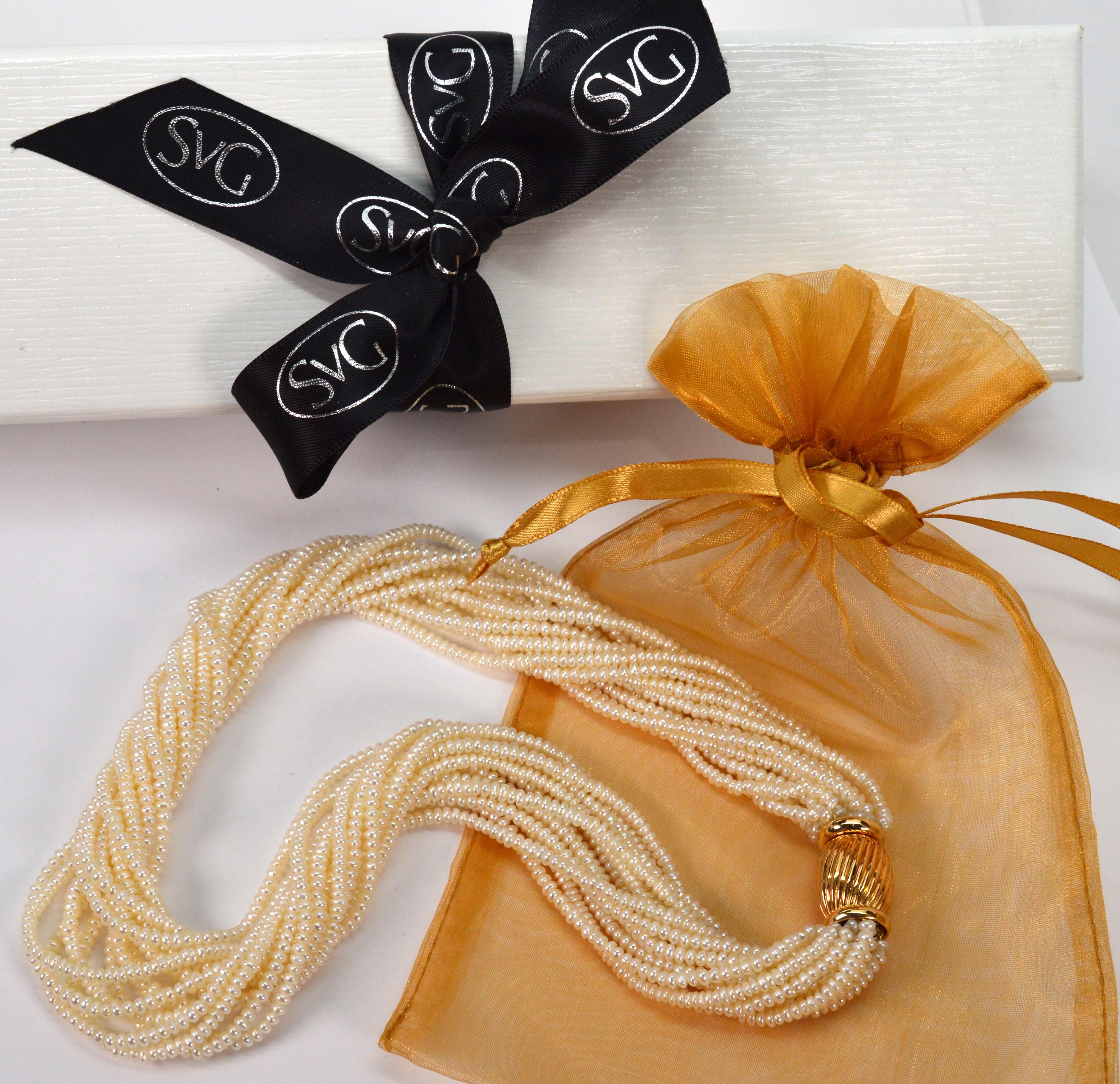 Multi Strand Pearl Twist Necklace w Decorative 14K Yellow Bow Tie Clasp In New Condition For Sale In Mount Kisco, NY
