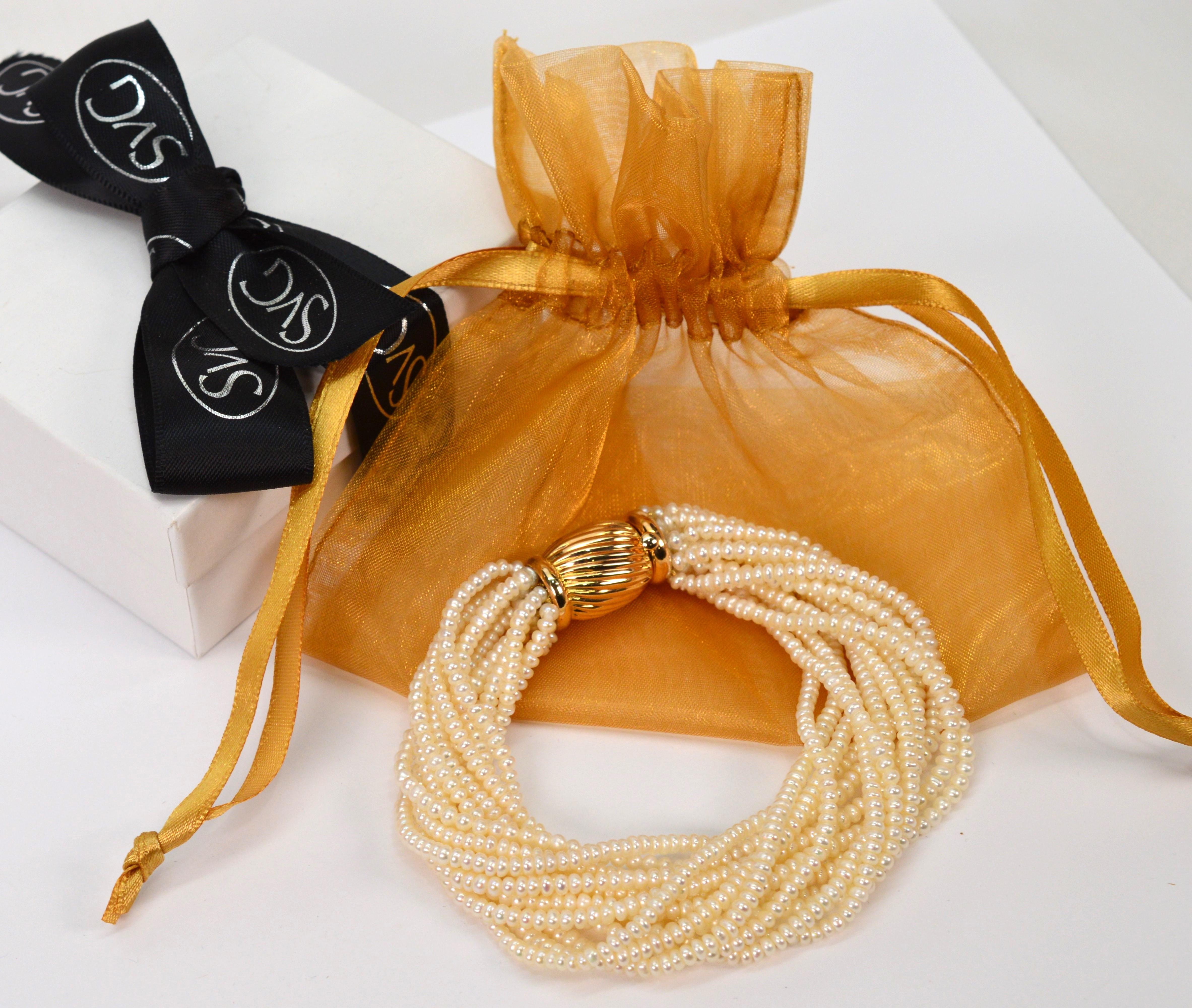 Multi Strand Pearl Twist Bracelet with Decorative 14K Yellow Gold Bow Tie Clasp For Sale 6
