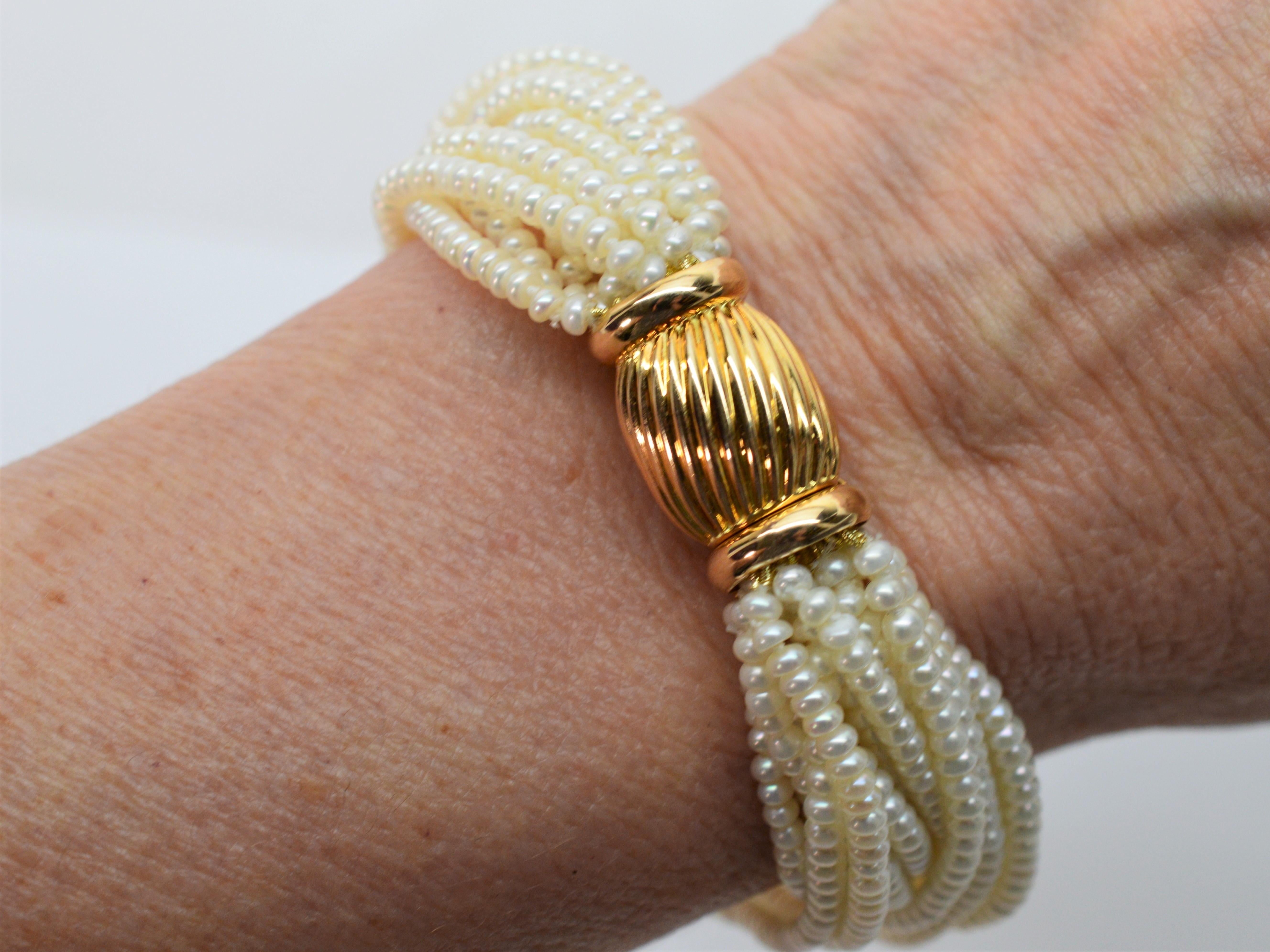 Multi Strand Pearl Wrap Bracelet with Decorative Yellow Gold Bow Tie Clasp In New Condition For Sale In Mount Kisco, NY