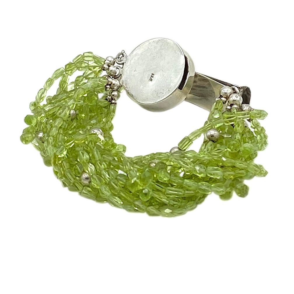 Bead Multi-strand Peridot Bracelet with Hammered Sterling Clasp For Sale