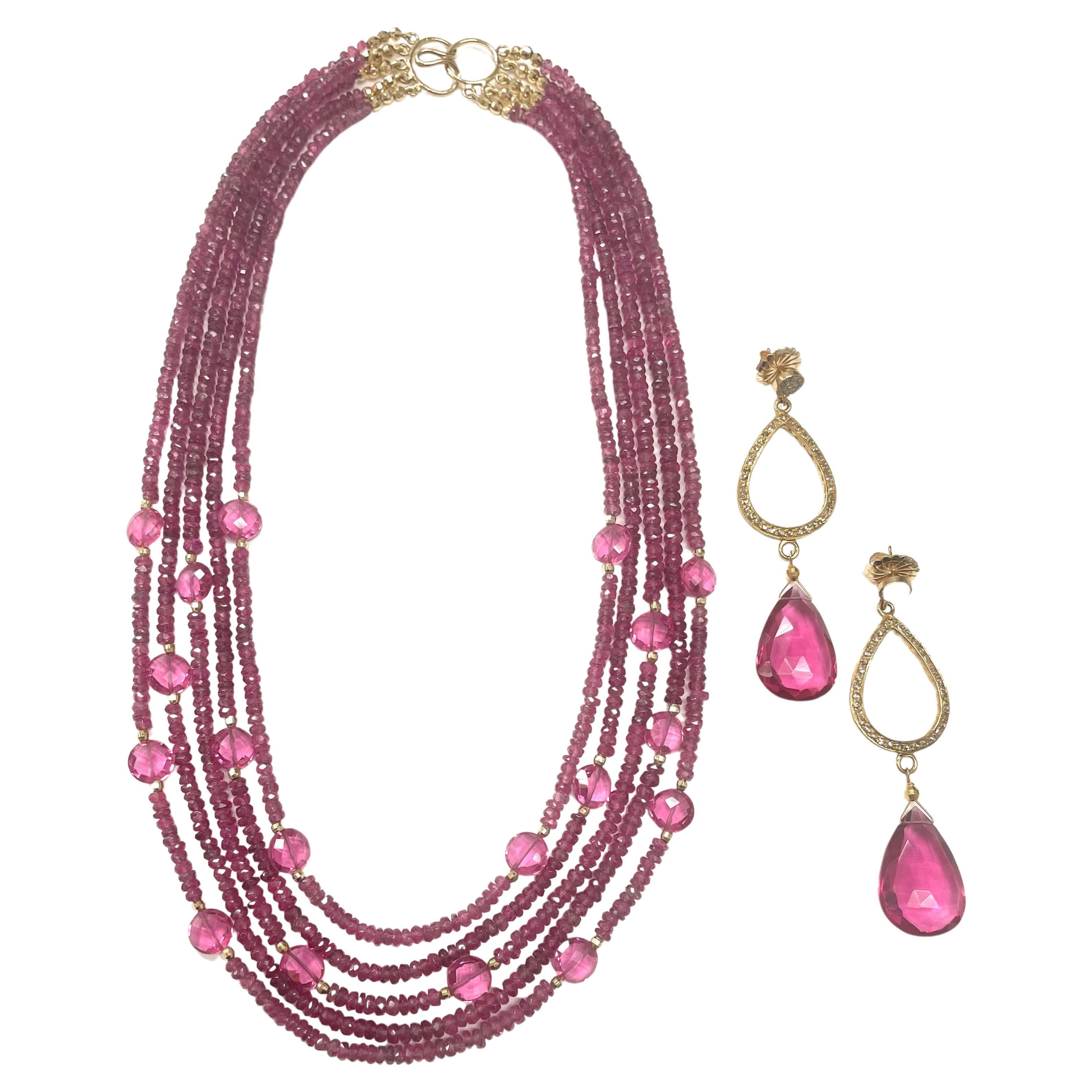 Description
5 Strand faceted pink Tourmaline rondelles, embellished with scattered coin shape hot pink Hydro Quartz and 14k yellow gold faceted balls. Item # N3709
Check out matching earrings (see photos), Item # E3313, $3,300.

Materials and