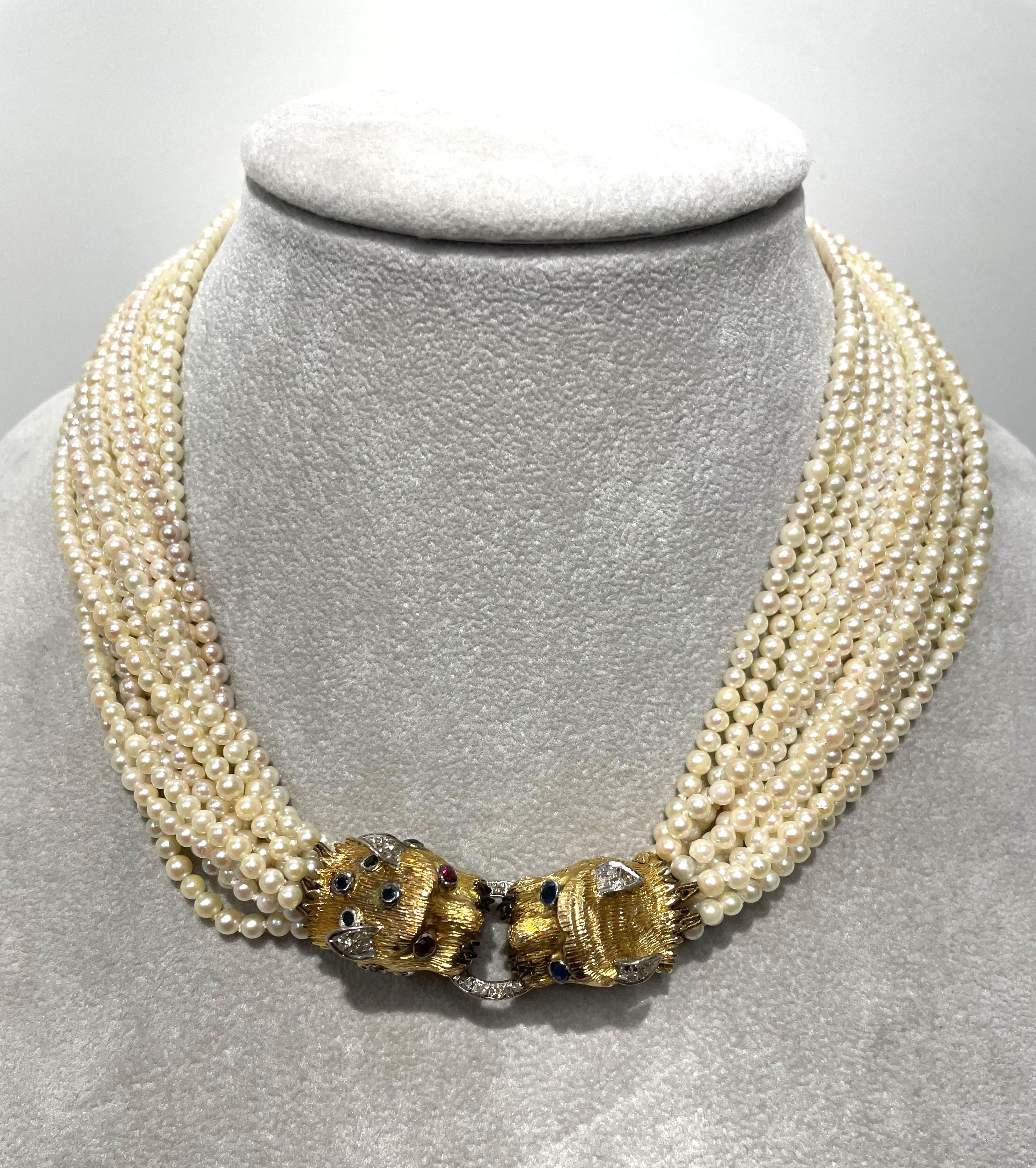 WOW- this estate necklace is an amazing statement piece!!
13 Strands- approximately 3mm round cream-colored seed pearls.
Approximately 17 inches long.
14 karat yellow gold 