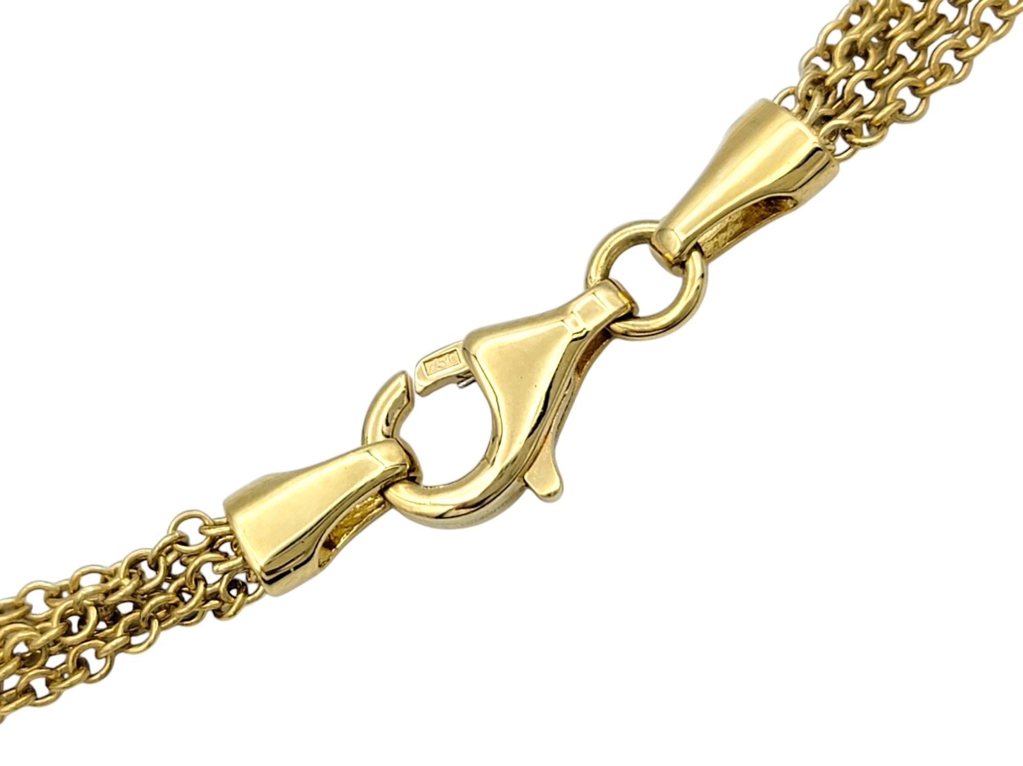 Mehrstrangige gestufte Diamant-Halo-Tropfen-Halskette aus 18 Karat Gelbgold im Zustand „Gut“ im Angebot in Scottsdale, AZ