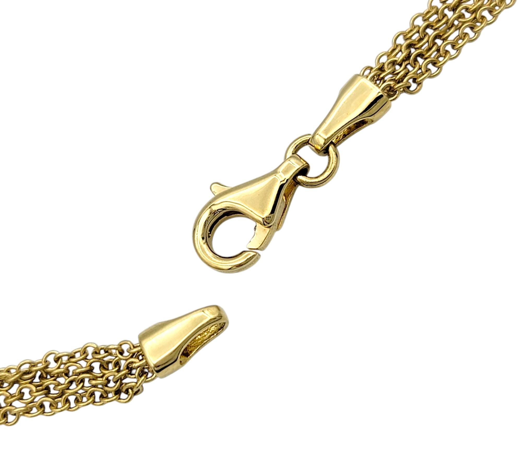 Mehrstrangige gestufte Diamant-Halo-Tropfen-Halskette aus 18 Karat Gelbgold Damen im Angebot