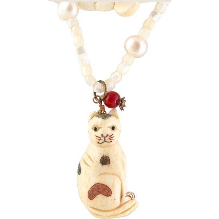 Modern Exolette Multi-Strand Vintage Pastel Stone & MOP Necklace with Bone Cat Pendant For Sale