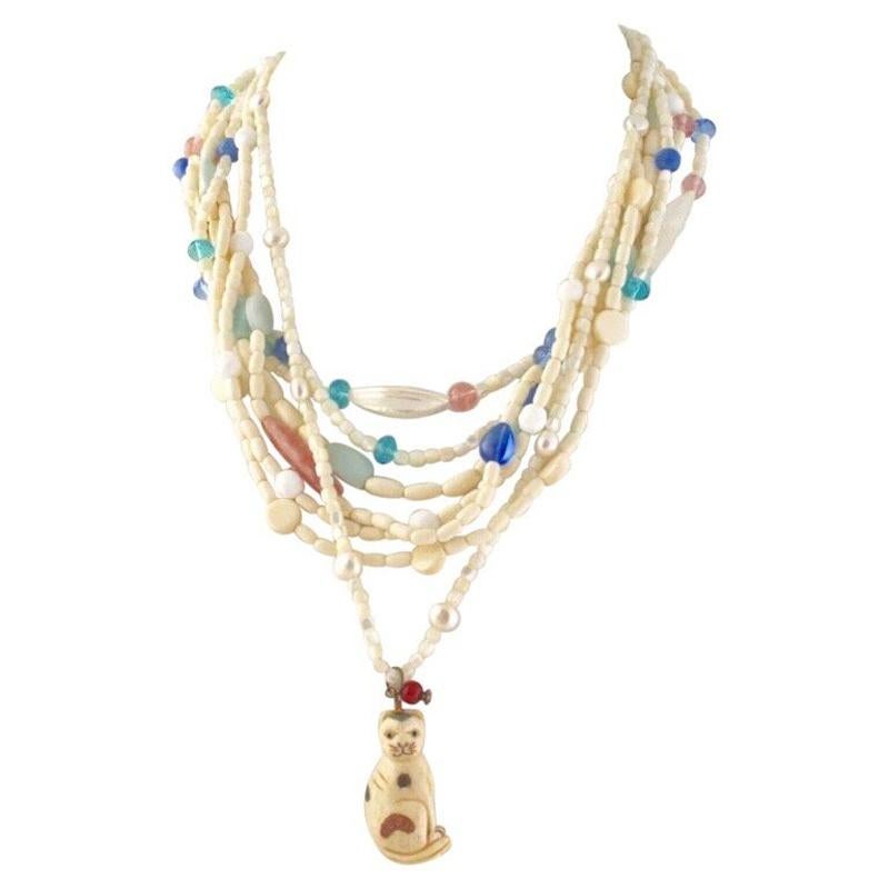 Exolette Multi-Strand Vintage Pastel Stone & MOP Necklace with Bone Cat Pendant For Sale