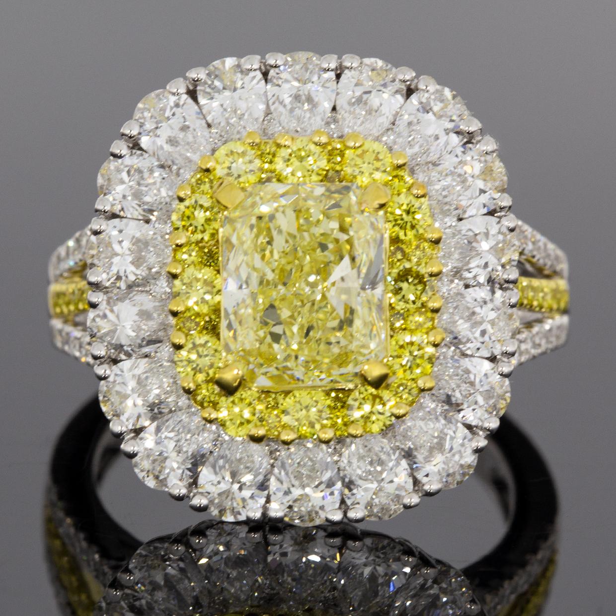 Women's 4.92 Carat GIA Certified Fancy Light Yellow Radiant Diamond Halo Engagement Ring