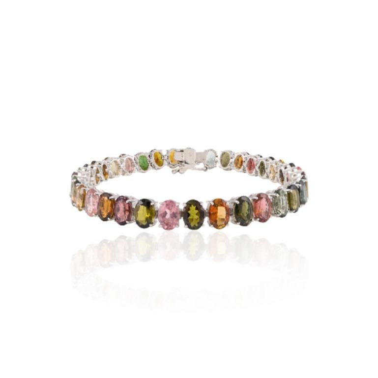 Beautifully handcrafted silver Multi Tourmaline Tennis Bracelet, designed with love, including handpicked luxury gemstones for each designer piece. Grab the spotlight with this exquisitely crafted piece. Inlaid with natural multi tourmaline