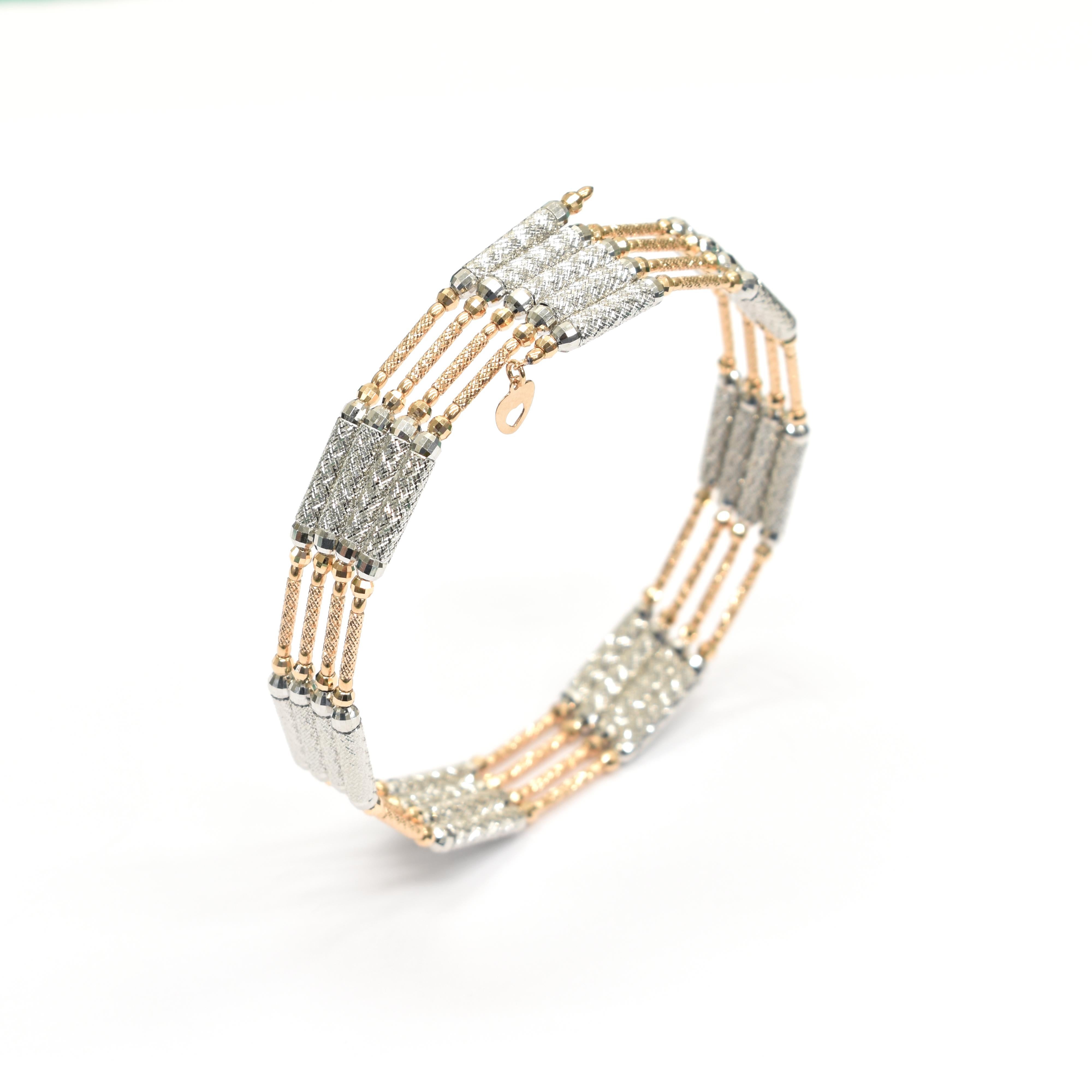 A stunning multi-use Bracelet-Necklace made in a combination of 18 Karat White and Rose Gold with a magnetic mechanism. Approximately 6.5 grams of Gold. Can also be used as an anklet. Made in Japan. Contact us for more information!