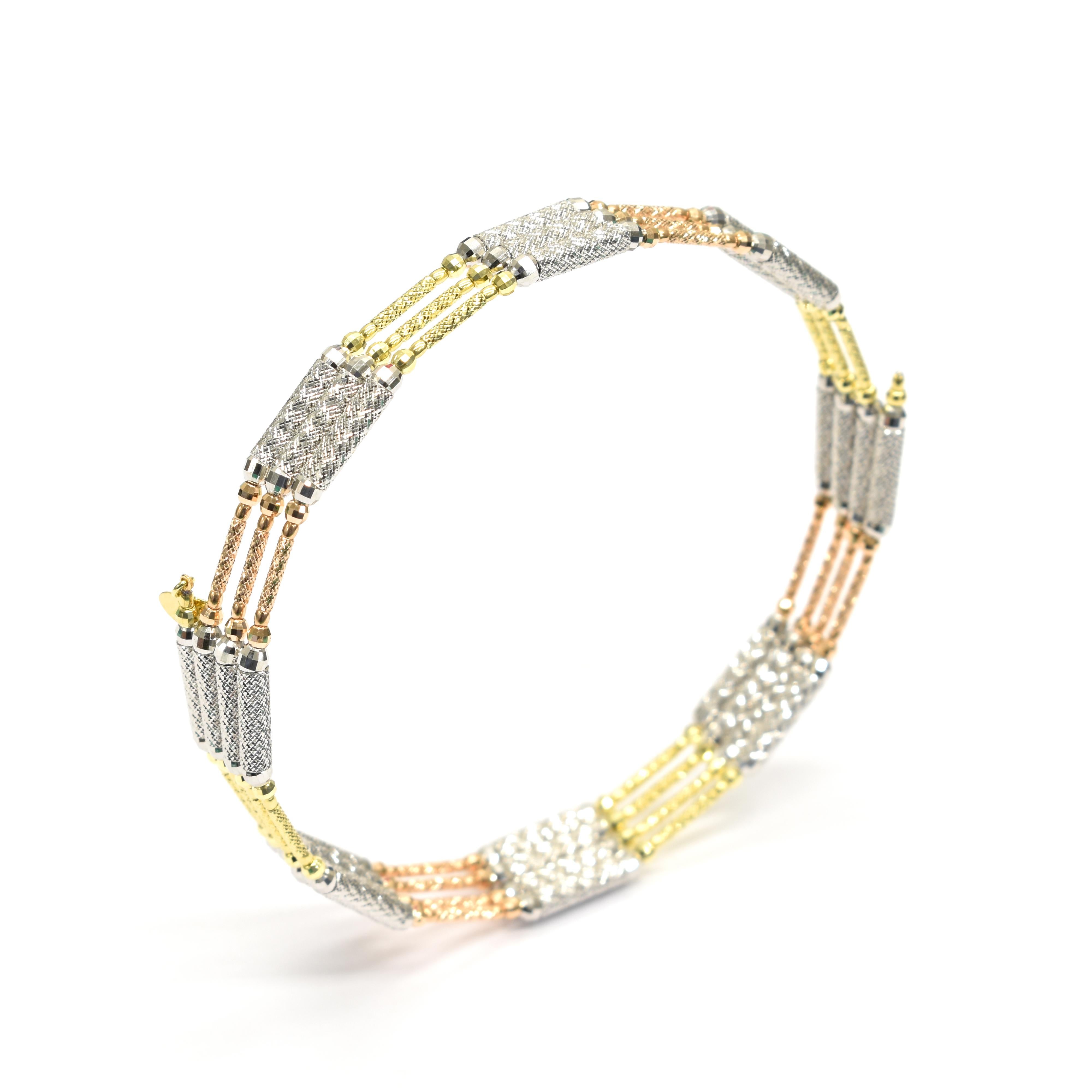 A stunning multi-use Bracelet-Necklace made in a combination of 18 Karat Yellow, White and Rose Gold with a magnetic mechanism. Approximately 6.5 grams of Gold. Can also be used as an anklet. Made in Japan. Contact us for more information!
