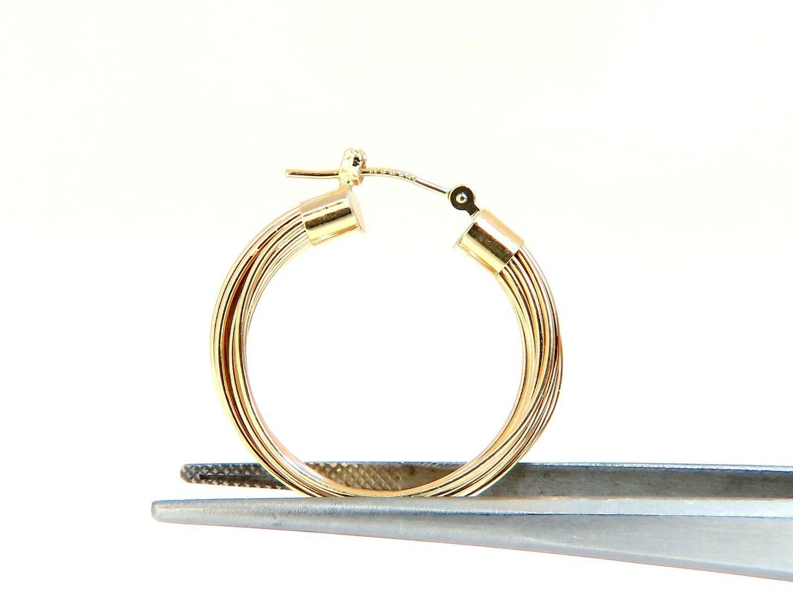 Multi-Wire Cable Linked Hoops

High Shine & Lever clip.

Measurements of Earrings: 1 inch diameter

4.5 grams / 14kt. yellow gold 

Entirely Handmade

Comfortable lever closure