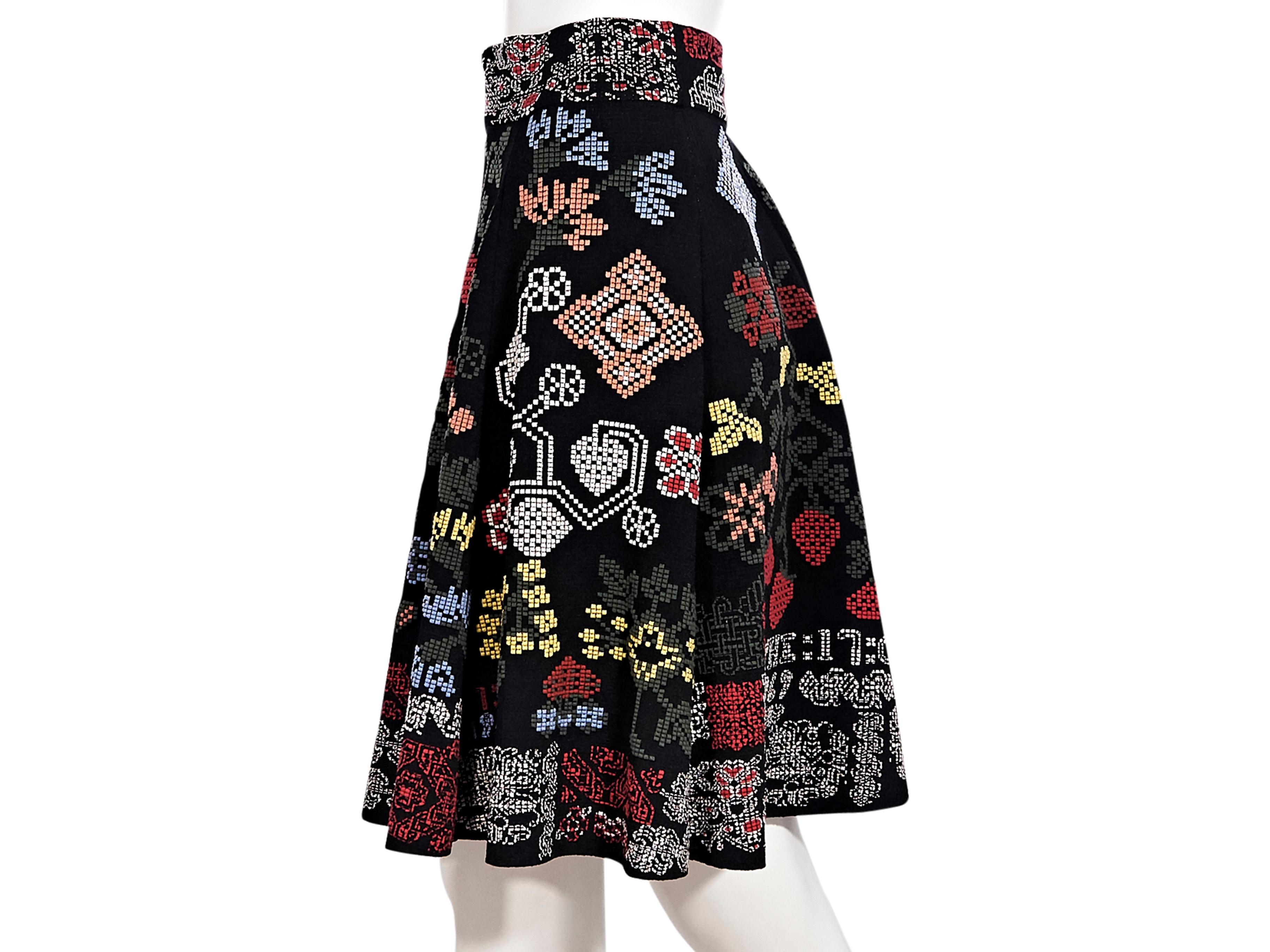 Product details:  Multicolor silk-blend stretch knit skirt by Alexander McQueen.  Banded waist.  Pull-on style.  27