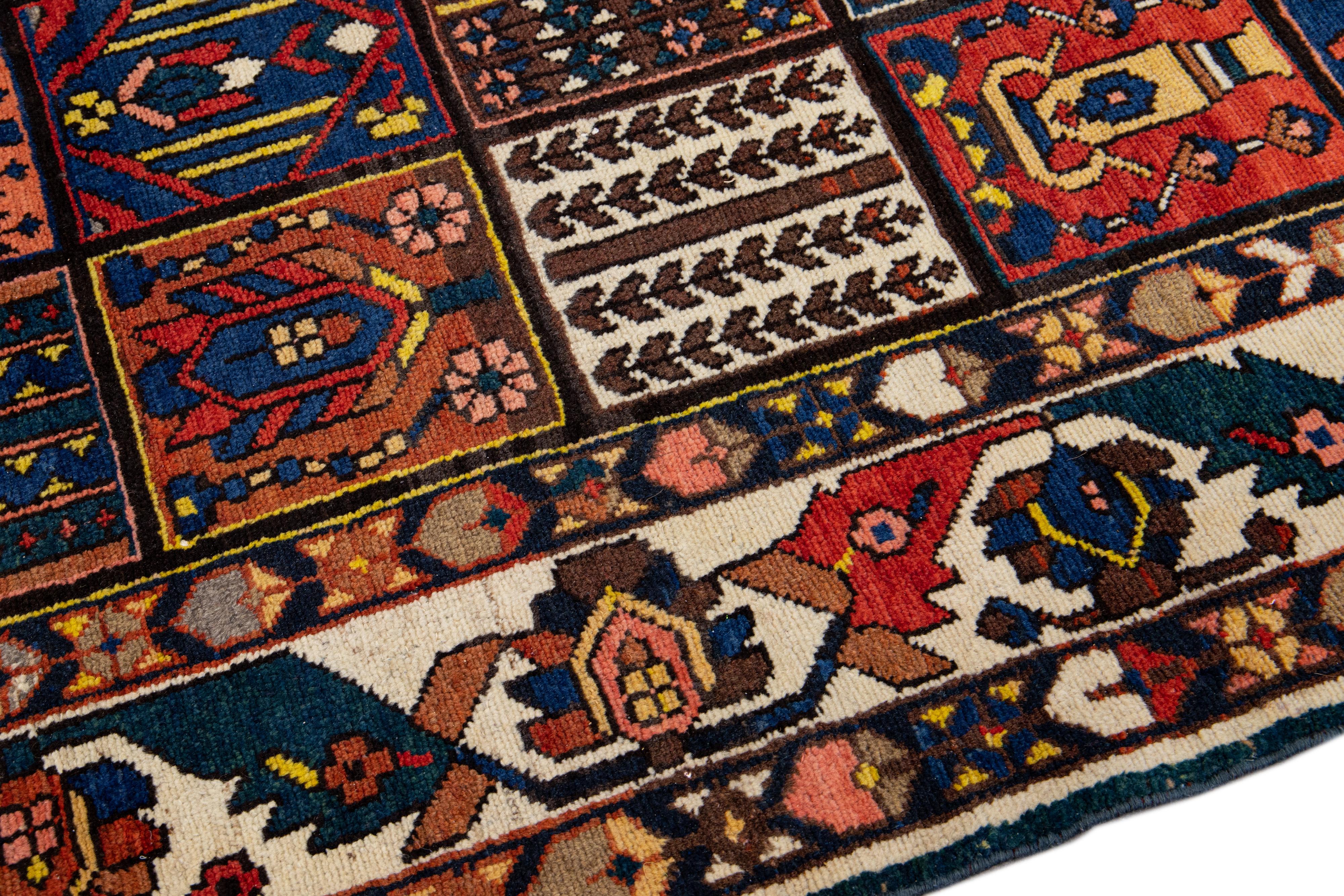 Mid-20th Century Multicolor Antique Persian Bakhtiari Handmade Allover Designed Wool Rug For Sale