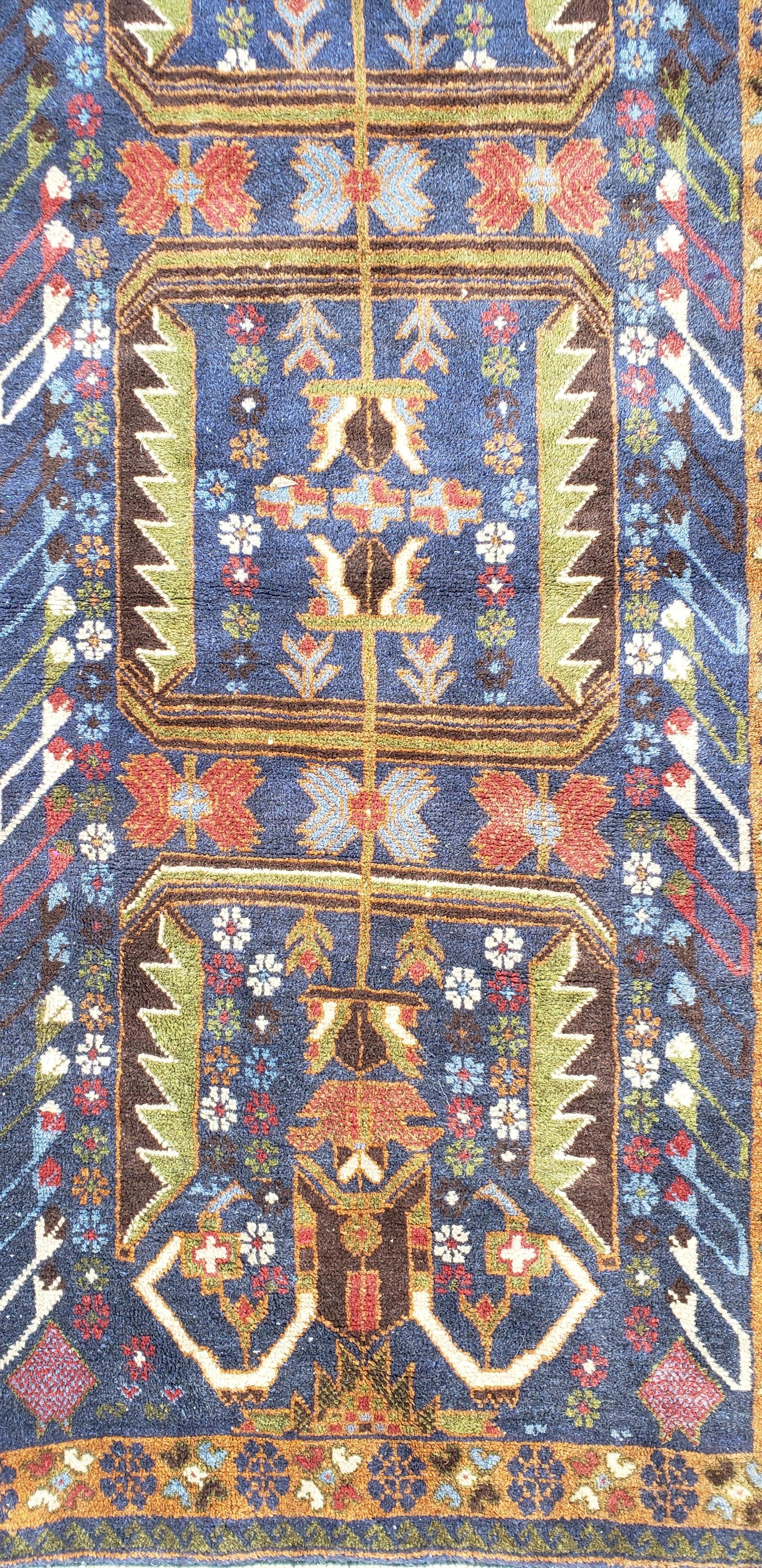 We carry some of the best Afghan rugs around, and if you like to give your hallway a colorful new look with one of our runners, we are here to help. This one measures approximately 114