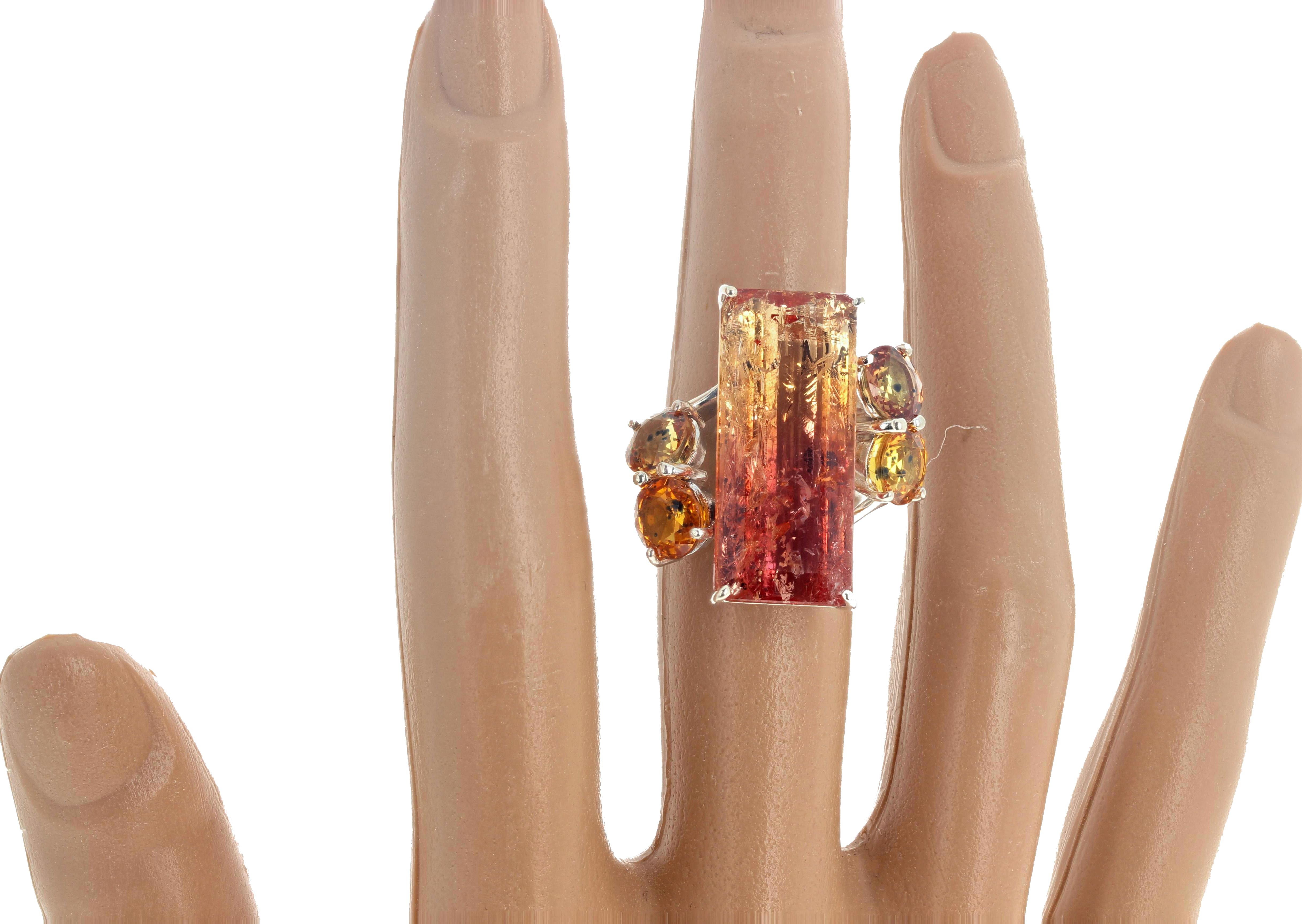 This gorgeous intense sparkling 12.30 carat natural Tourmaline (25.3mm x 11mm)  is enhanced with 4 glittering Songea Sapphires with the natural famous 